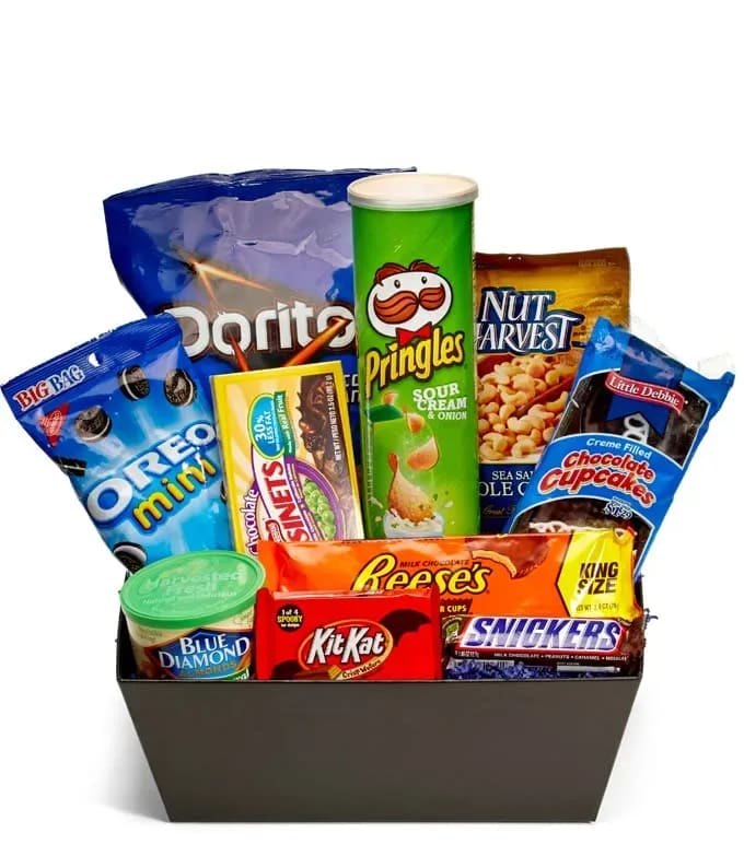 Snack Basket - This snack basket is a great gift for family members, friends, or that special someone in your life. The snack basket includes 2 sodas, mini bags of chips, candy and more. This is perfect for curling up on the couch for a movie night with your friends or your loved one.