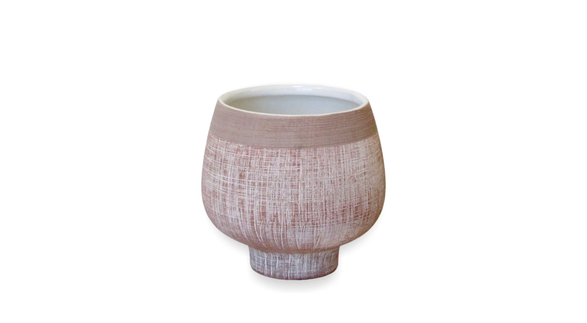 Textured pink ceramic vase on a white background