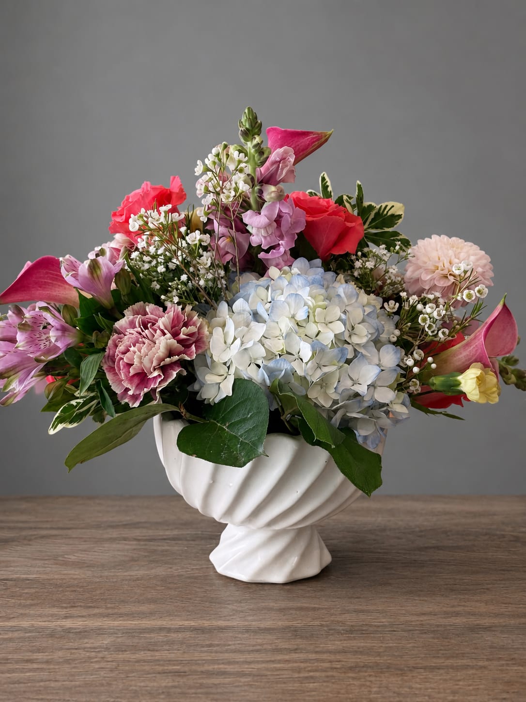 Harbor  - Leave it to our designers to create something beautiful. Using the freshest seasonal blooms available, each arrangement is thoughtfully handcrafted with color, texture, and style in mind. Every design is one of a kind, making it the perfect choice for birthdays, celebrations, thank-yous, sympathy, or just because.  Photos shown are for inspiration only. Flower varieties and colors will vary based on seasonal availability, ensuring every arrangement is fresh and unique. 