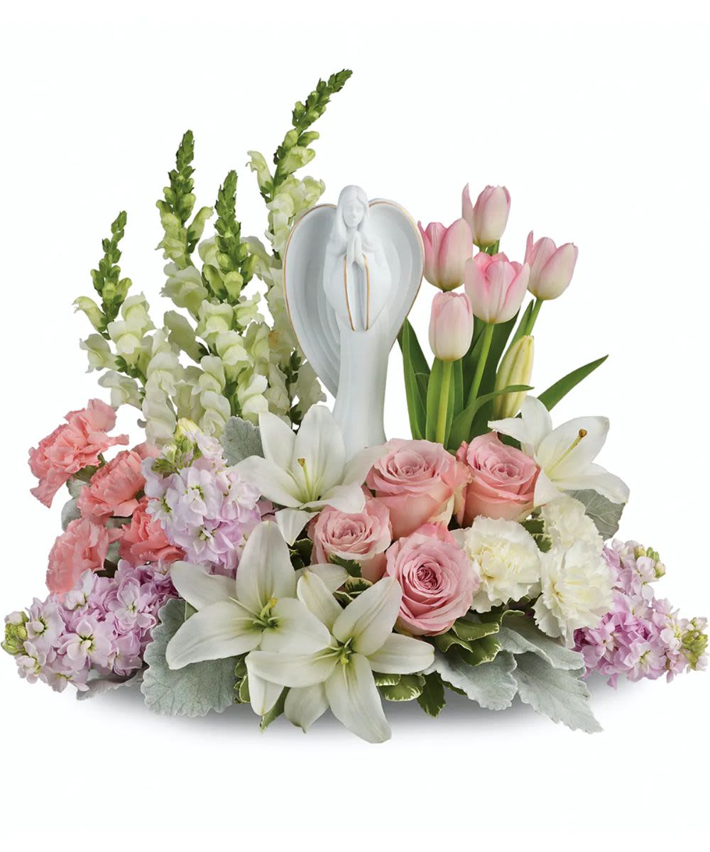 Velvet Heavens Tribute Arrangement - This arrangement focuses on the enduring nature of the ceramic angel as a symbol of a loved one's spirit. Colors and angles may vary depending on flower availability. 
