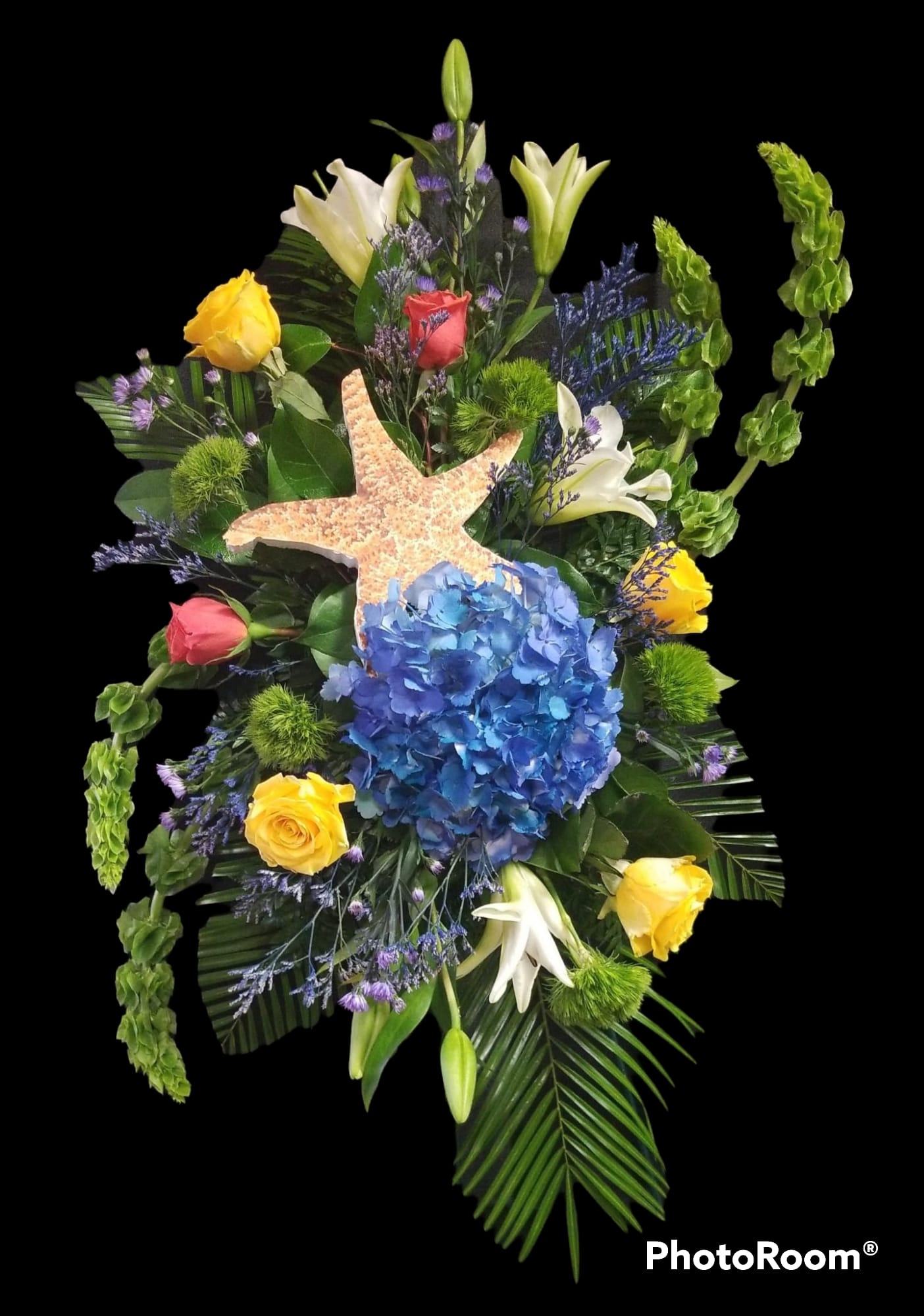Love Star - Standing spray with a star detail and tropical elegant flowers