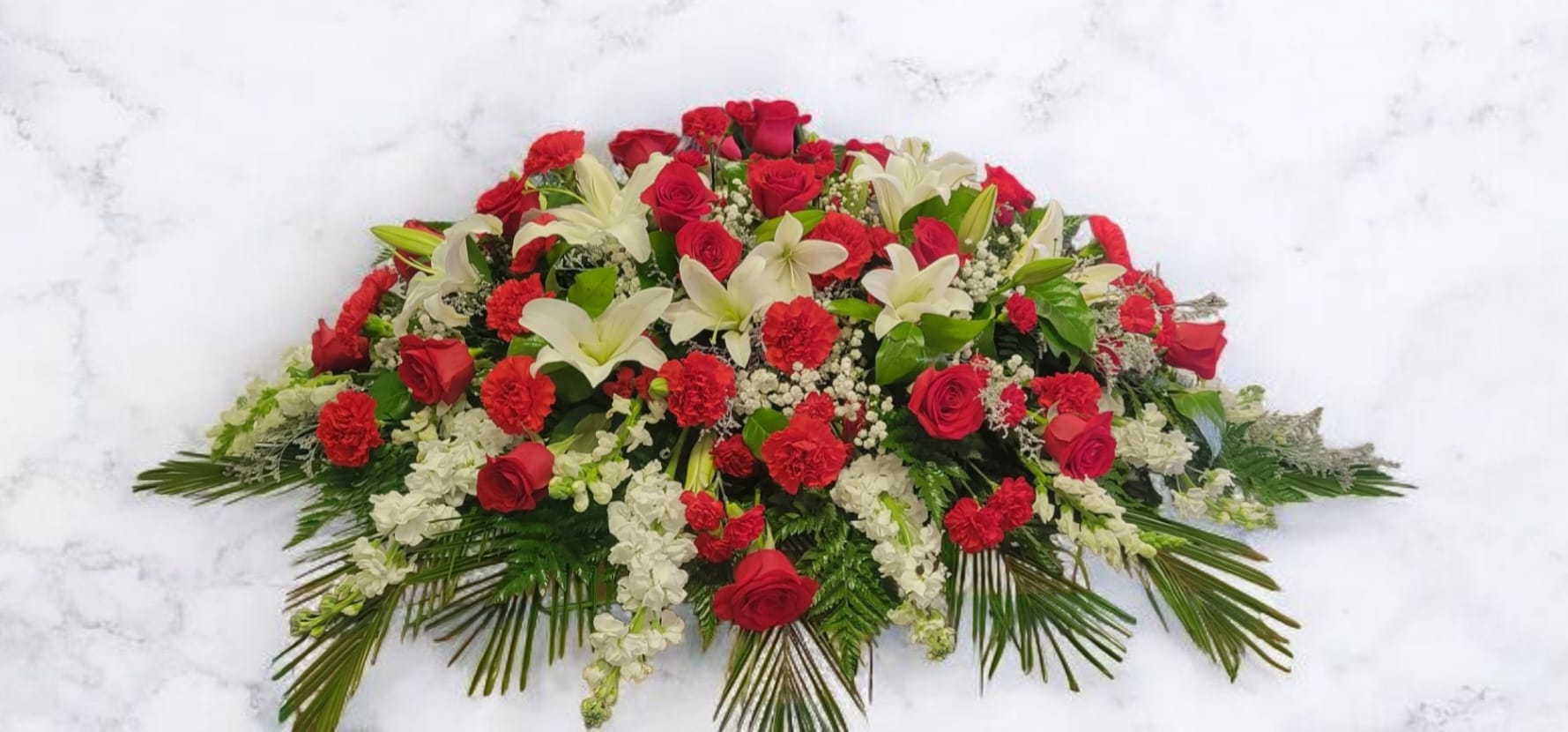 Majestic - Half Casket with elegant assorted of roses and lilies