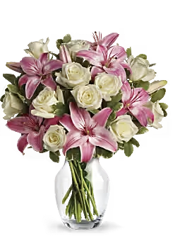 Blush Garden Bouquet - beautiful and elegant bouquet featuring fresh pink lilies and soft white blooms, carefully arranged to create a perfect balance of color and charm. Accented with delicate greenery, this arrangement is ideal for expressing love, appreciation, and joy on any special occasion.