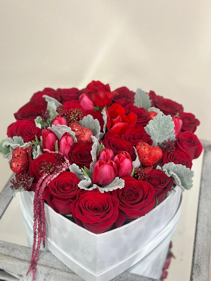 Sweet Romance - A bright and cheerful arrangement of red , inspired by the beauty of summer. Full of life and vibrant energy, this bouquet brings warmth, joy, and a playful touch of color to any moment.