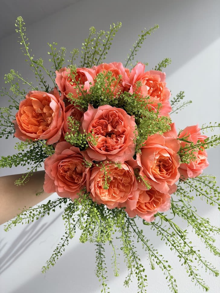 Coral Roses - Tried and true roses with greens.
