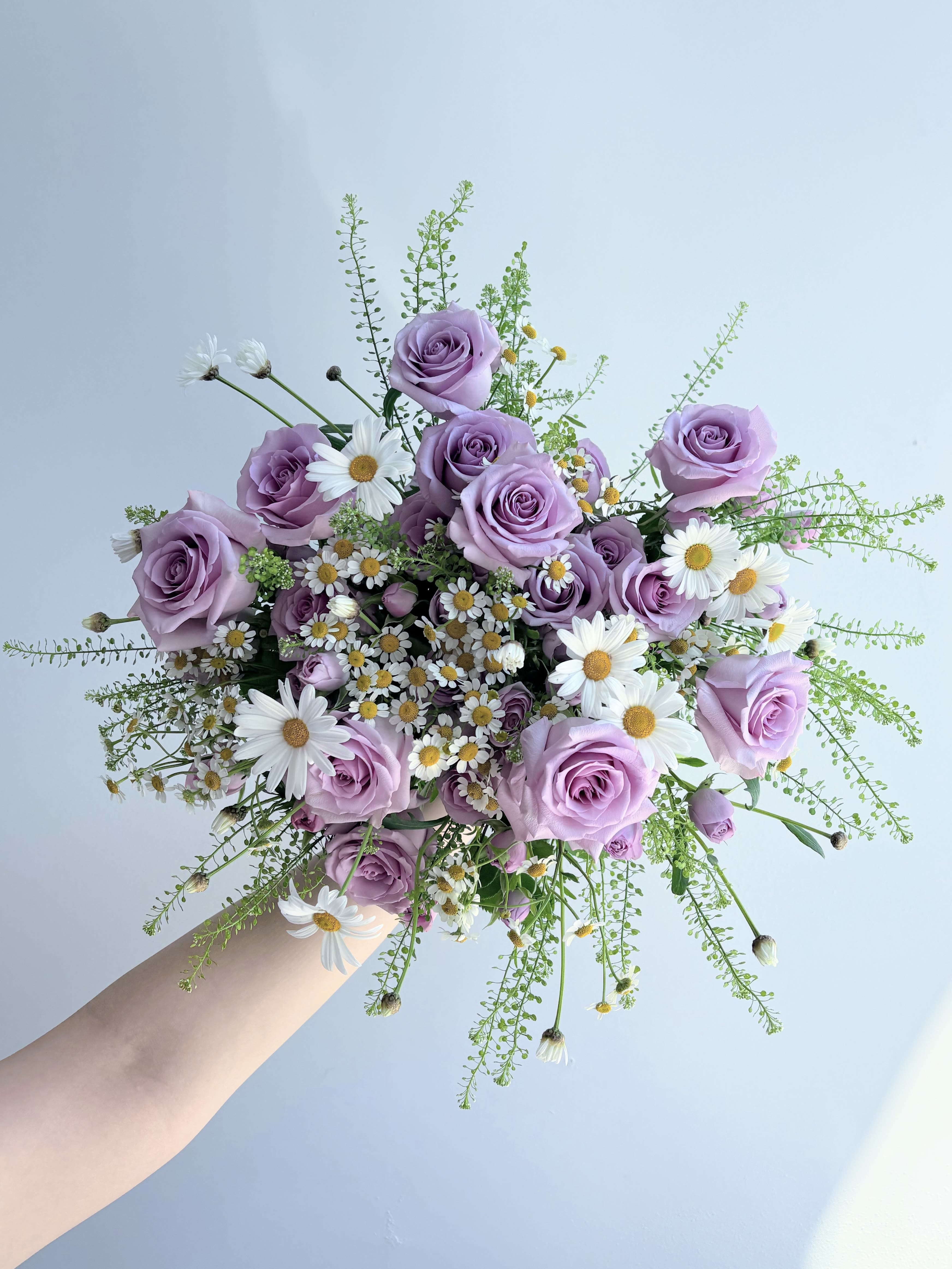 Ethereal - A flirty take on the standard rose bouquet.  *Vase not included
