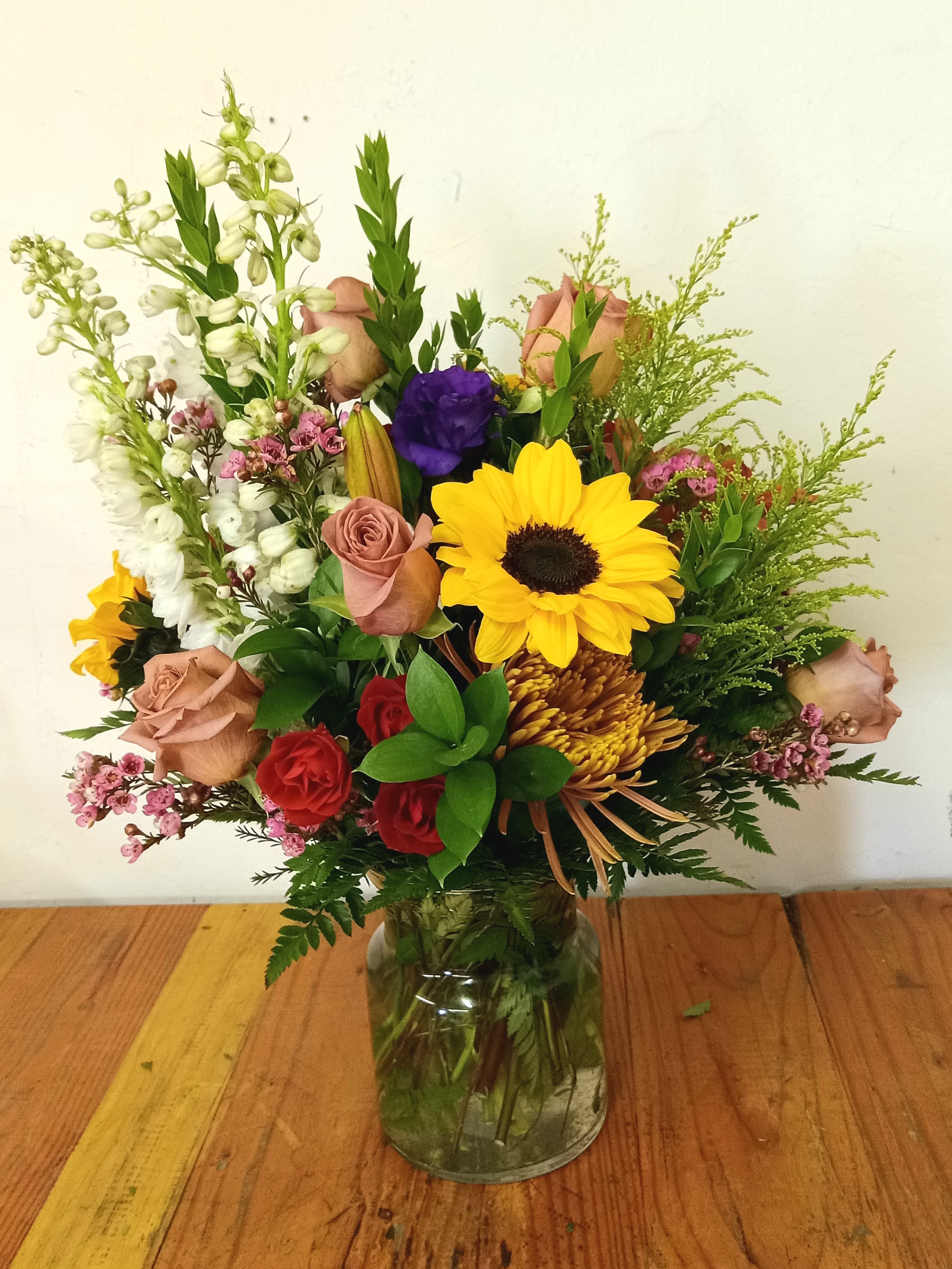 Summer in France Bouquet - The Summer in France Bouquet features a custom palette of vibrant, organically styled blooms that evoke the charm of a French summer garden. Designed to bring natural elegance to any space, it captures the essence of seasonal beauty.