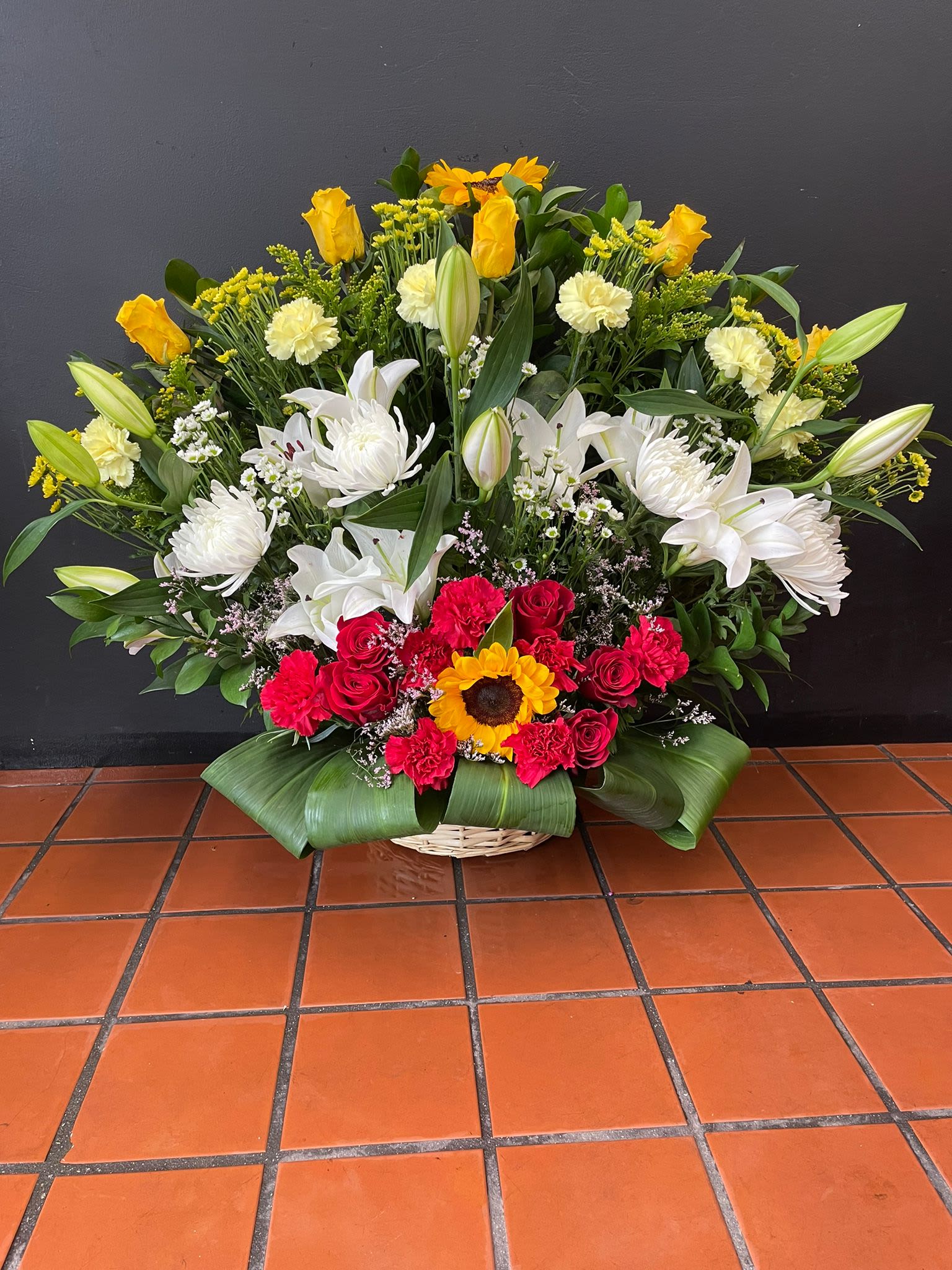 Summer Times Floral Basket - Beautiful arrangement for a funeral home or family event