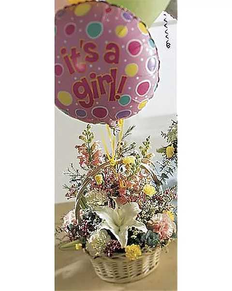 Baby Girl Bouquet with Ballons - A terrific gift for a new baby girl. A basket full of flowers is finished with 1 mylar and 3 multi-colored latex balloon in an impressive display. The arrangement includes white lilies, roses, pink snapdragons, white and pink carnations and more. 