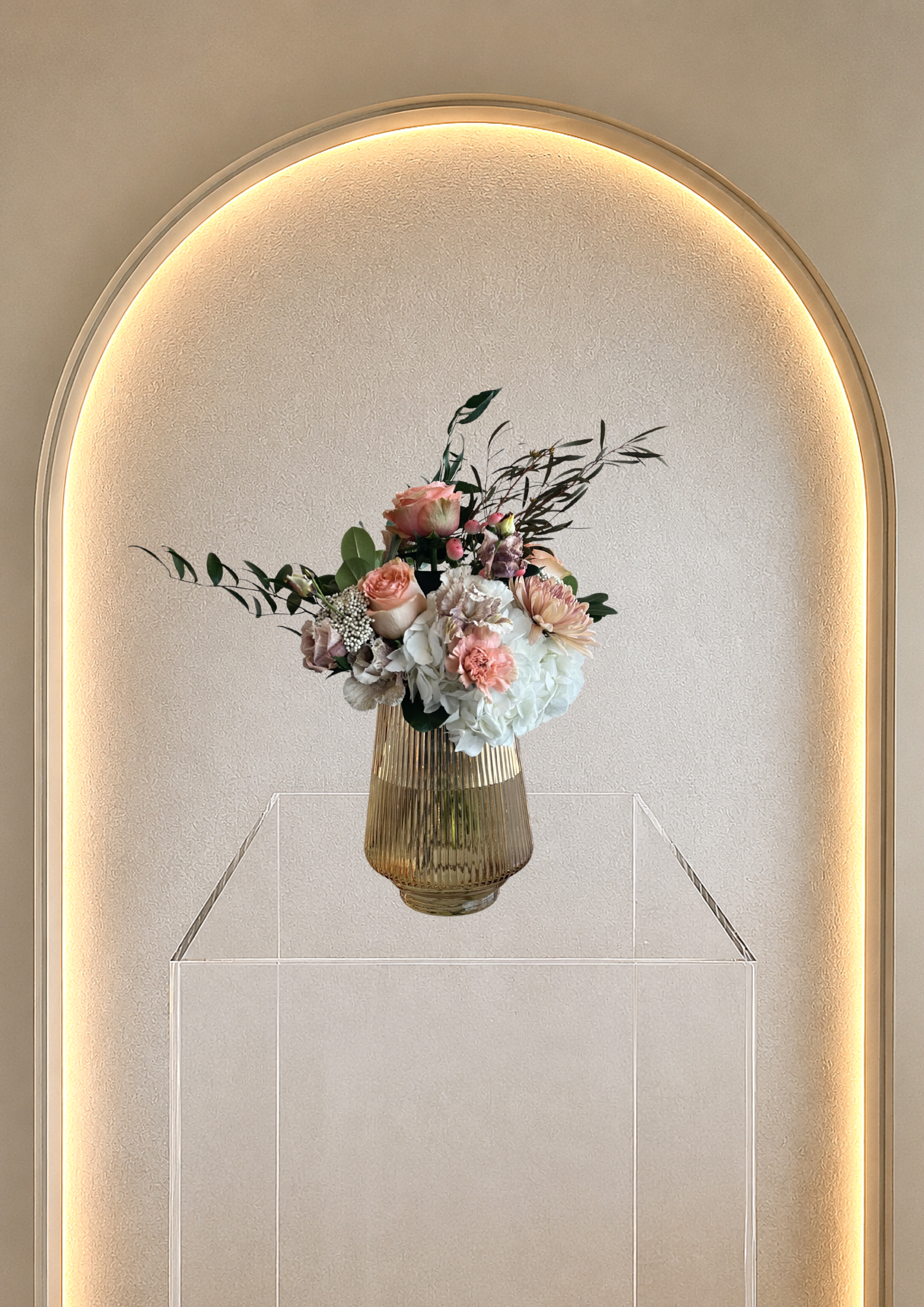 Amber Glow - Blush roses, hydrangeas, pale carnations and soft chrysanthemums in a ribbed amber vase-an elegant, serene arrangement perfect for birthdays, anniversaries, or thoughtful home décor. 