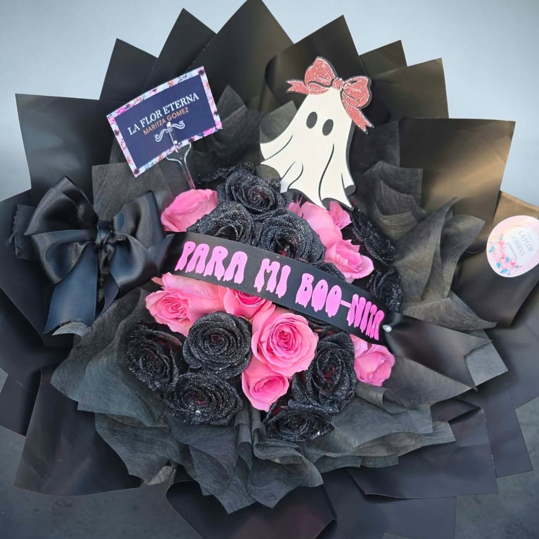 Black and pink rose bouquet with a ghost decoration and Halloween sign