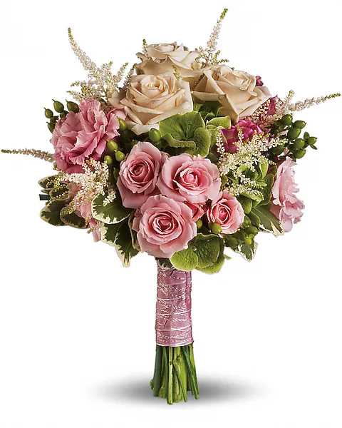 Hand-tied bouquet of blush pink and cream roses with pink accents and wrapped stems