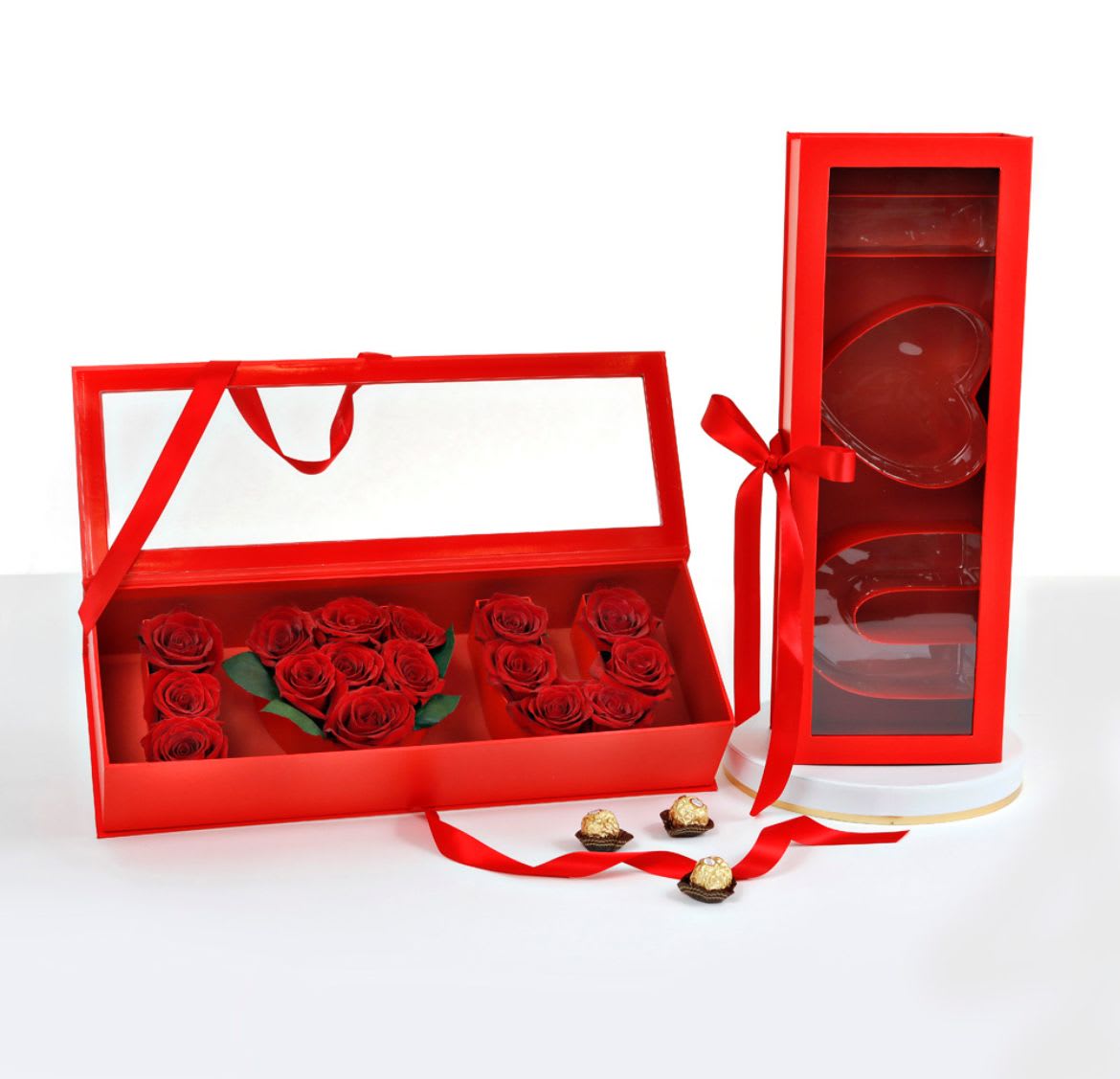 Love Message Box – I Love You Rose Arrangement - Make your message unforgettable with this elegant “I Love You” rose box — a luxurious floral gift designed to speak from the heart. Each compartment forms a letter or symbol, beautifully filled with premium roses to create a romantic statement piece. Perfect for anniversaries, birthdays, proposals, or simply to express love in a unique and stylish way. The composition combines modern design with timeless beauty, making it not just a gift, but an experience. The box is crafted in a refined, minimalist style and finished with a satin ribbon for an extra touch of elegance.  Customization available: • Box colors: red, gold, white, pink, black • Rose colors: red, white, pink, mixed, or any preferred palette Each arrangement is made individually with attention to detail and your personal wishes.
