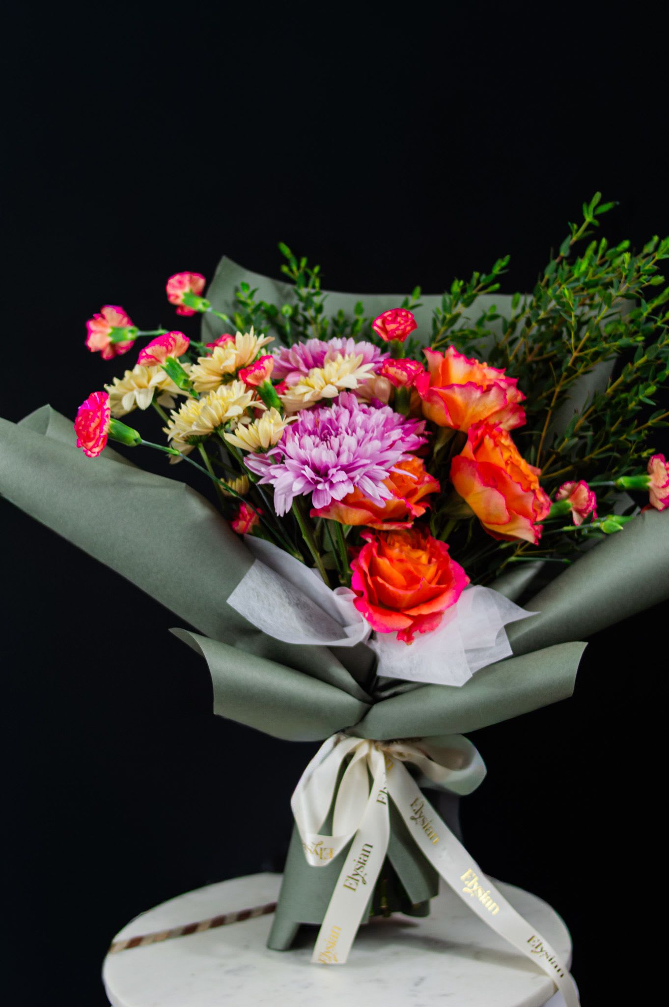 Color Rush - Designed to spark joy and make a statement, this bouquet is perfect for birthdays, congratulations, or anyone who loves life in full colour. Expressive and modern, Color Rush turns every moment into something unforgettable.  A celebration of colour, confidence, and creativity.  Disclaimer: Due to the seasonal nature of flowers, we select the freshest blooms available. Flower varieties may vary, but we always preserve the bold colour palette, style, and overall aesthetic shown.