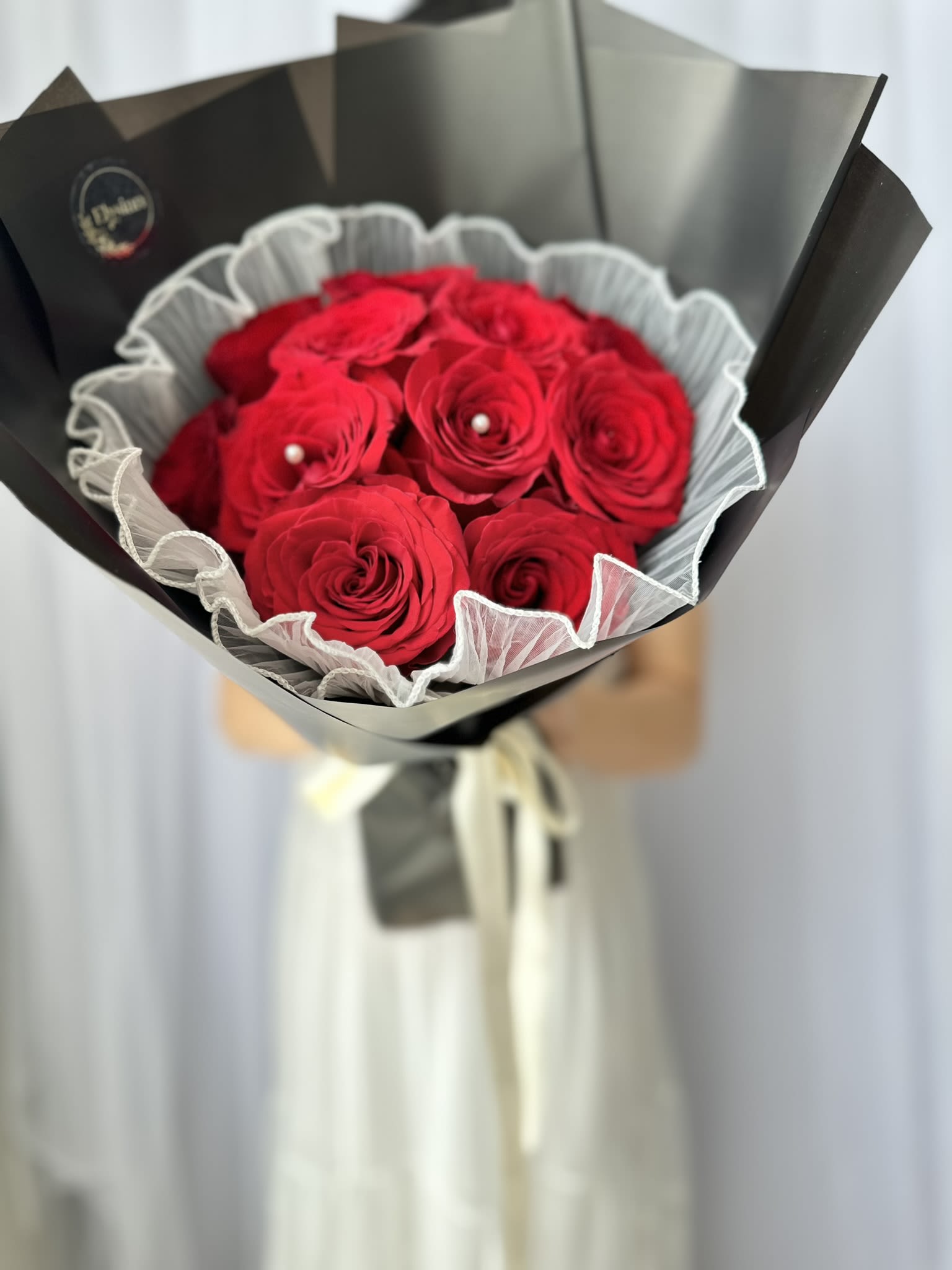 Eternal Romance Red (12 roses) - Introducing our Eternal Romance Bouquet, a luxurious arrangement designed to captivate and enchant. This exquisite bouquet features twelve fresh, velvety roses, each bloom symbolizing deep love and passion.&nbsp;  Whether for an Anniversary, Valentine's Day, or to say "I love you," the Eternal Romance Bouquet is perfect for expressing profound love and romance.