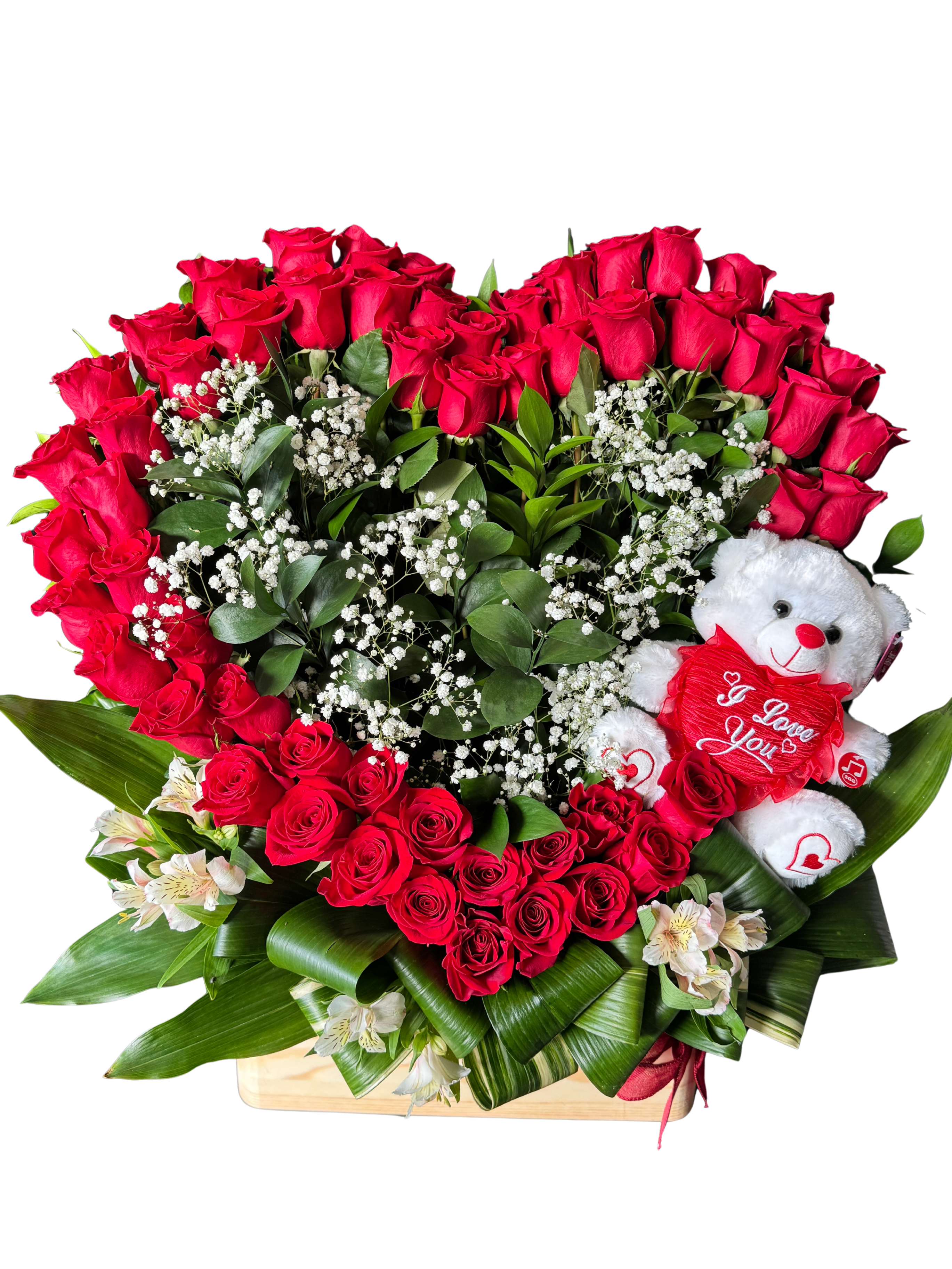 Red rose arrangement with a white teddy bear holding a heart
