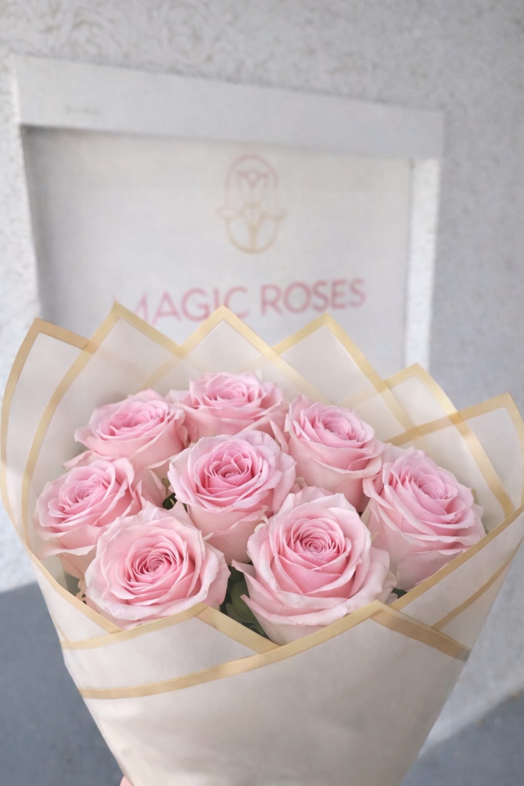 Elegant Pink Rose Bouquet - 12 stunning bouquet of premium soft pink roses, beautifully wrapped in elegant cream paper with delicate gold trim. This arrangement features fresh, hand-selected roses with lush petals and a timeless romantic look perfect for women's day, Mother's Day, birthdays, anniversaries, special celebrations, or simply to brighten someone’s day.