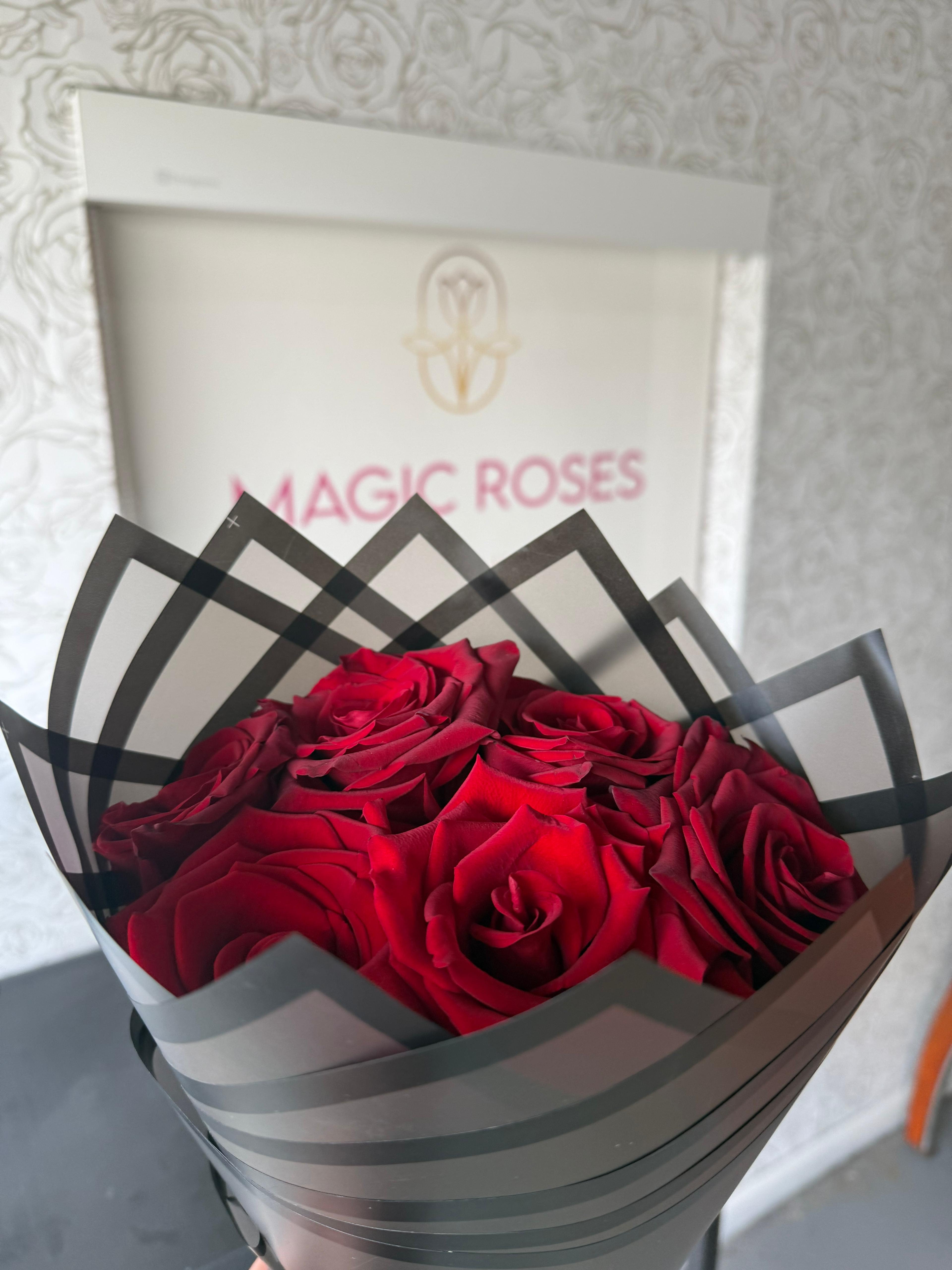 Eternal Passion – Dozen Roses - Our Eternal Passion bouquet features a dozen premium red roses, hand-selected and beautifully wrapped in a modern, elegant design that highlights their deep color and natural beauty. Perfect for anniversaries, birthdays, romantic surprises, or simply to say “I’m thinking of you.”