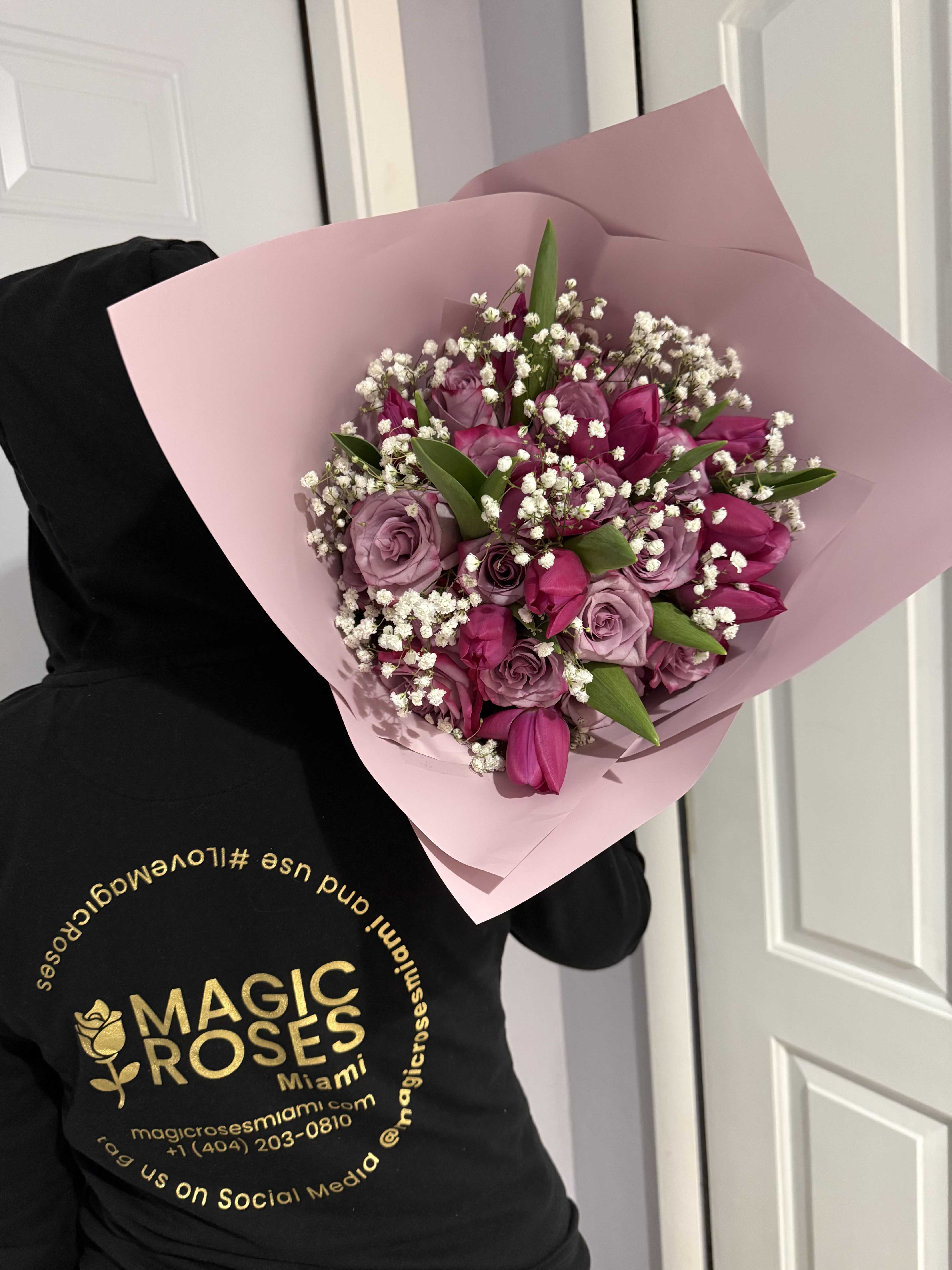 Roses &amp; Tulips Luxury Blooms - A beautiful blend of fresh roses and vibrant tulips, this bouquet captures elegance and charm in every detail. The soft blush tones paired with lively pink hues create a romantic and eye-catching arrangement, complemented by delicate accents that add texture and freshness. Perfect for gifting, it’s a timeless expression of love and sophistication.