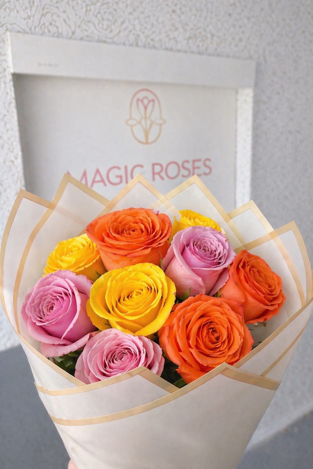 Rainbow Spring Roses Bouquet - A burst of cheerful color, a rounded hand-tied arrangement perfect for  Mother's Day, birthdays, congratulations, or simply to brighten someone's day. The mixed-color roses make a joyful statement that feels celebratory without being over the top, the kind of bouquet that will make the person you're thinking of genuinely smile.  Care is simple: keep in fresh water, trim stems every few days, and display out of direct sunlight to extend bloom life.