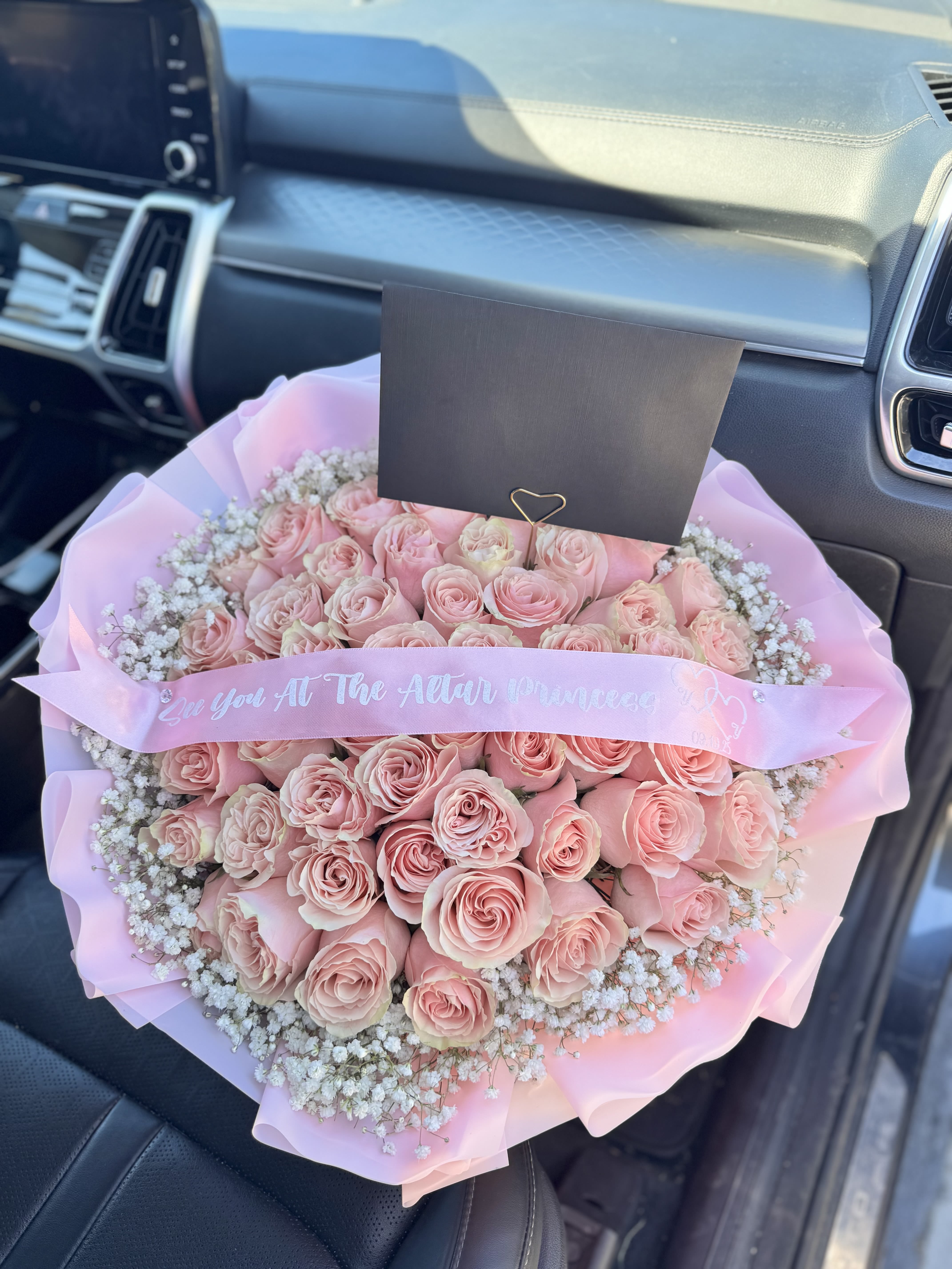 Pink Blush - 75 pink roses surrounded with a cloud of babys breath