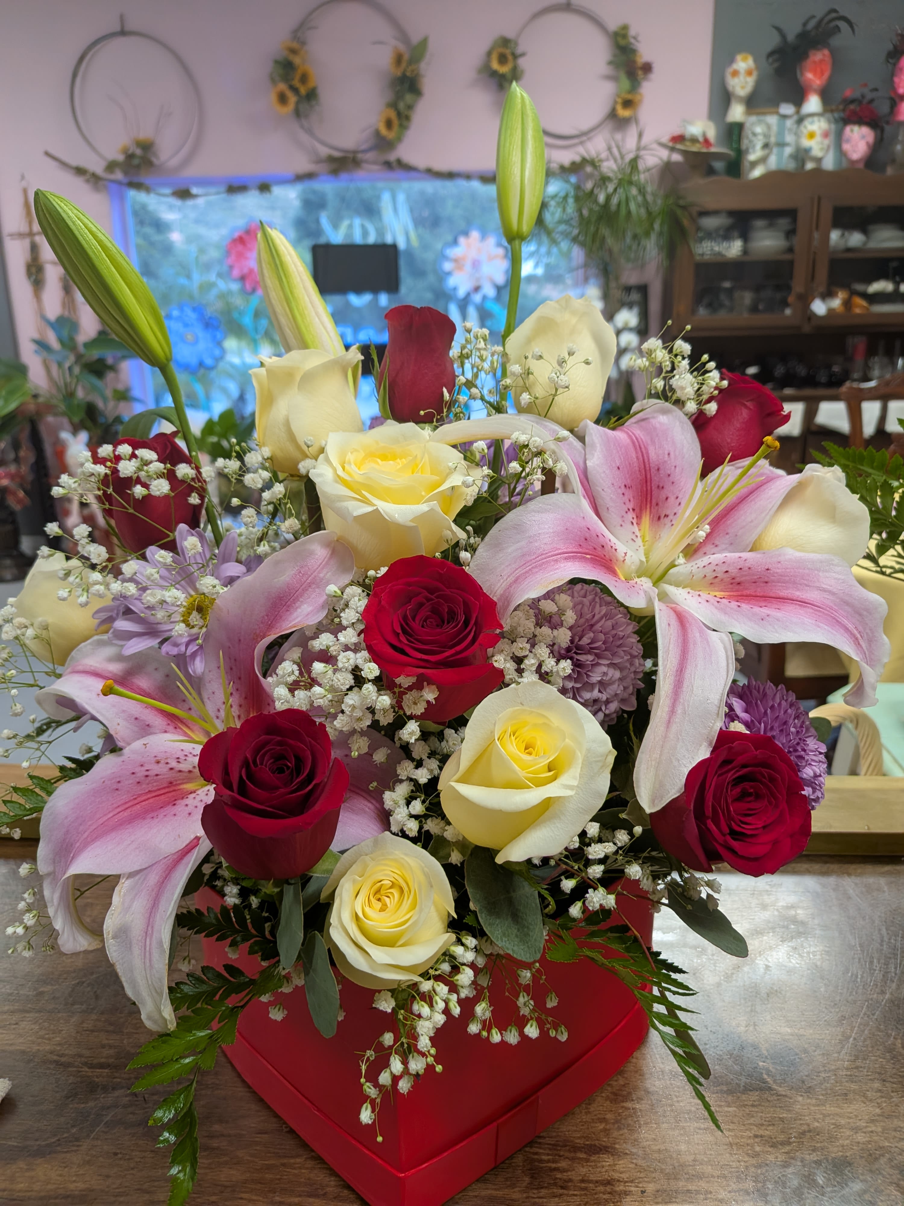 Mix bouquet  - A mix of red and white roses with stargazer lilies.