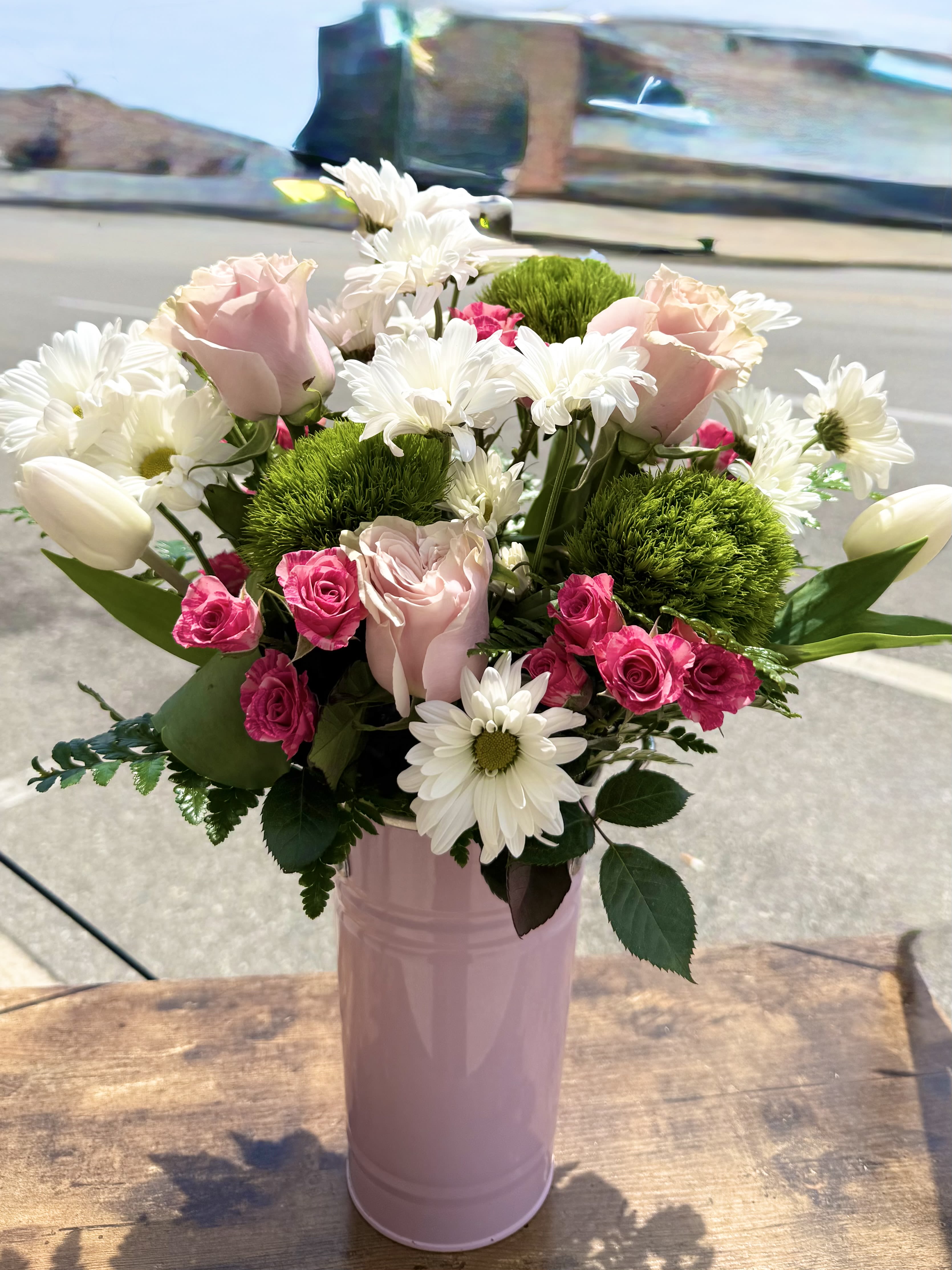 Posh Pinks - Shades of pinks and whites in this keepsake container. Featuring roses, spray roses, daisy's, tulips and more! 