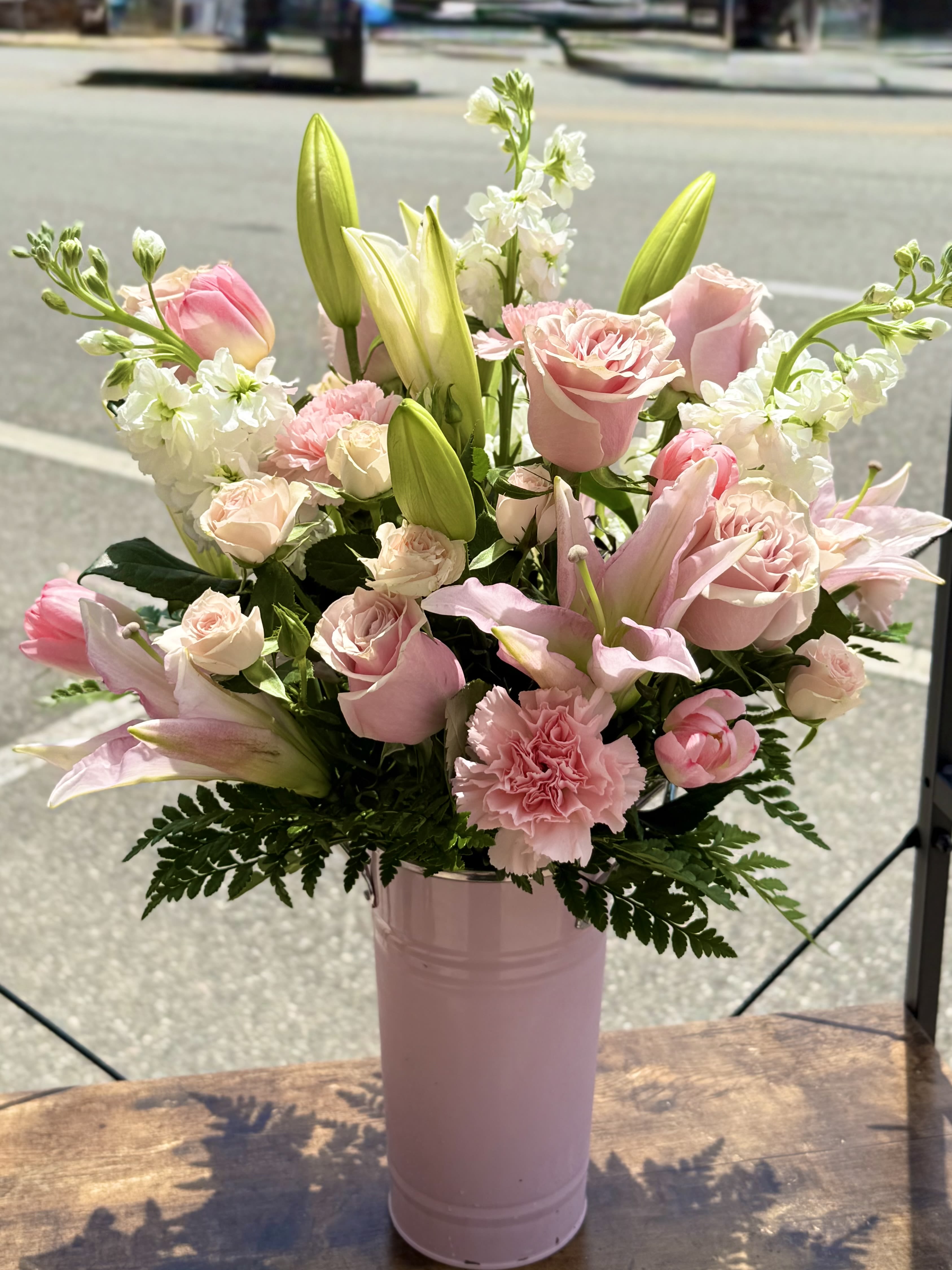 The Sweet Stassi  - Fragrant lilies and stock! Roses and spray roses! Tulips and carnations! All in shades of pinks designed in our pink keepsake vase. 