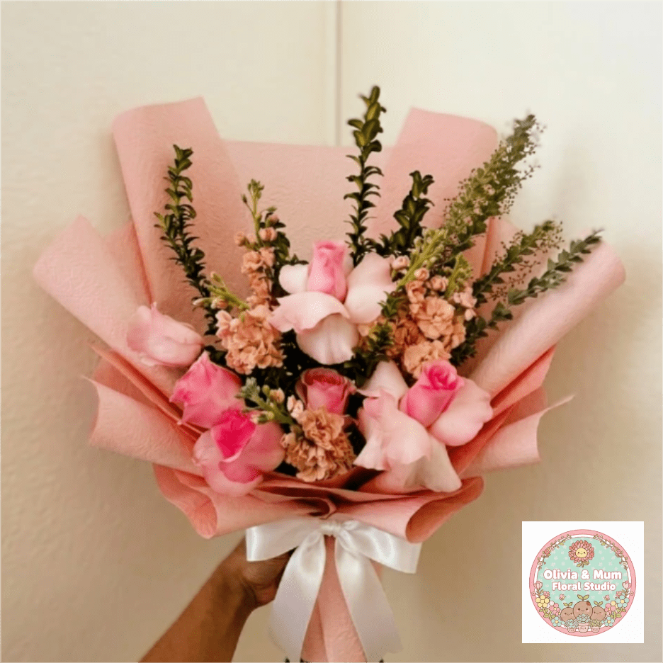 Blushing Love - Soft, romantic, and deeply fragrant—Blushing Love is a timeless tribute to your unique story. This lush arrangement pairs premium light pink roses with the spicy scent of peach stock to create a sensory experience that feels both classic and heartfelt.  This seasonal bouquet features: - Premium Light Pink Roses - Fragrant Peach Stock - Lush Garden Greens - Queen Anne's Lace - Purple Allium - Pink Hydrangeas - Hot Pink Snapdragons  Presentation: Expertly wrapped in our signature textured paper and tied with satin ribbon. Prefer a vase? Add one to your cart to complete the look.   Personal Touch: We’ll include a custom card message with every order. You’ll be able to write your message at checkout.   Please Note: All flowers are subject to seasonal availability. If a specific bloom isn’t available, our designers will thoughtfully substitute with flowers in a similar shape, style, and color.   Standard size shown. Vase upgrade is optional.