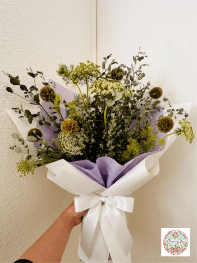Soft Shadows - Understated, elegant, and textural—Soft Shadows focuses on the subtle beauty of monochromatic tones. The pairing of earthy scabiosa and delicate Queen Anne’s Lace is a quiet, sophisticated way to say "I'm sorry for your loss."  This seasonal bouquet features:  Brown Scabiosa Pods  Queen Anne’s Lace  Silvery Gunni Eucalyptus  Garden Greens  Presentation: Expertly wrapped in our signature textured paper and tied with satin ribbon. Prefer a vase? Add one to your cart to complete the look.  Personal Touch: We’ll include a custom card message with every order. You’ll be able to write your message at checkout.  Please Note: All flowers are subject to seasonal availability. If a specific bloom isn’t available, our designers will thoughtfully substitute with flowers in a similar shape, style, and color.  Standard size shown. Vase upgrade is optional.   Floral Care Guide  Your arrangement arrives in our signature "double wrap" and is nestled in a protective box. While the stems are secured with a wet wrap for transit they are ready for a full drink!   Unpack: Gently lift the bouquet from the box. Remove the plastic bag and wet towel from the stems. Trim &amp; Hydrate: Trim 1/2" off stems at an angle and place in a clean vase with cool water. Refreshed: Change water daily for a long-lasting bloom.  