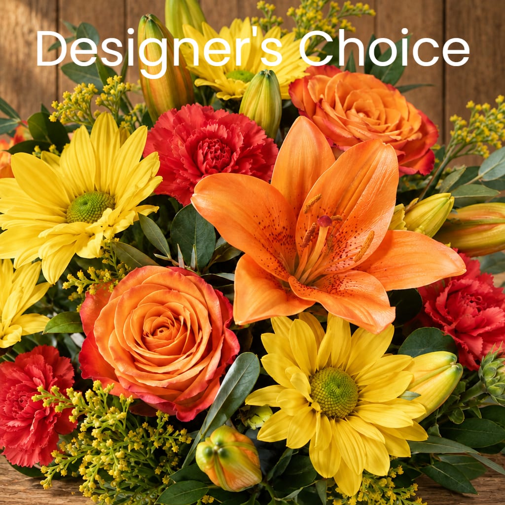 Bright mixed bouquet with orange roses, yellow daisies, red carnations, and an orange lily
