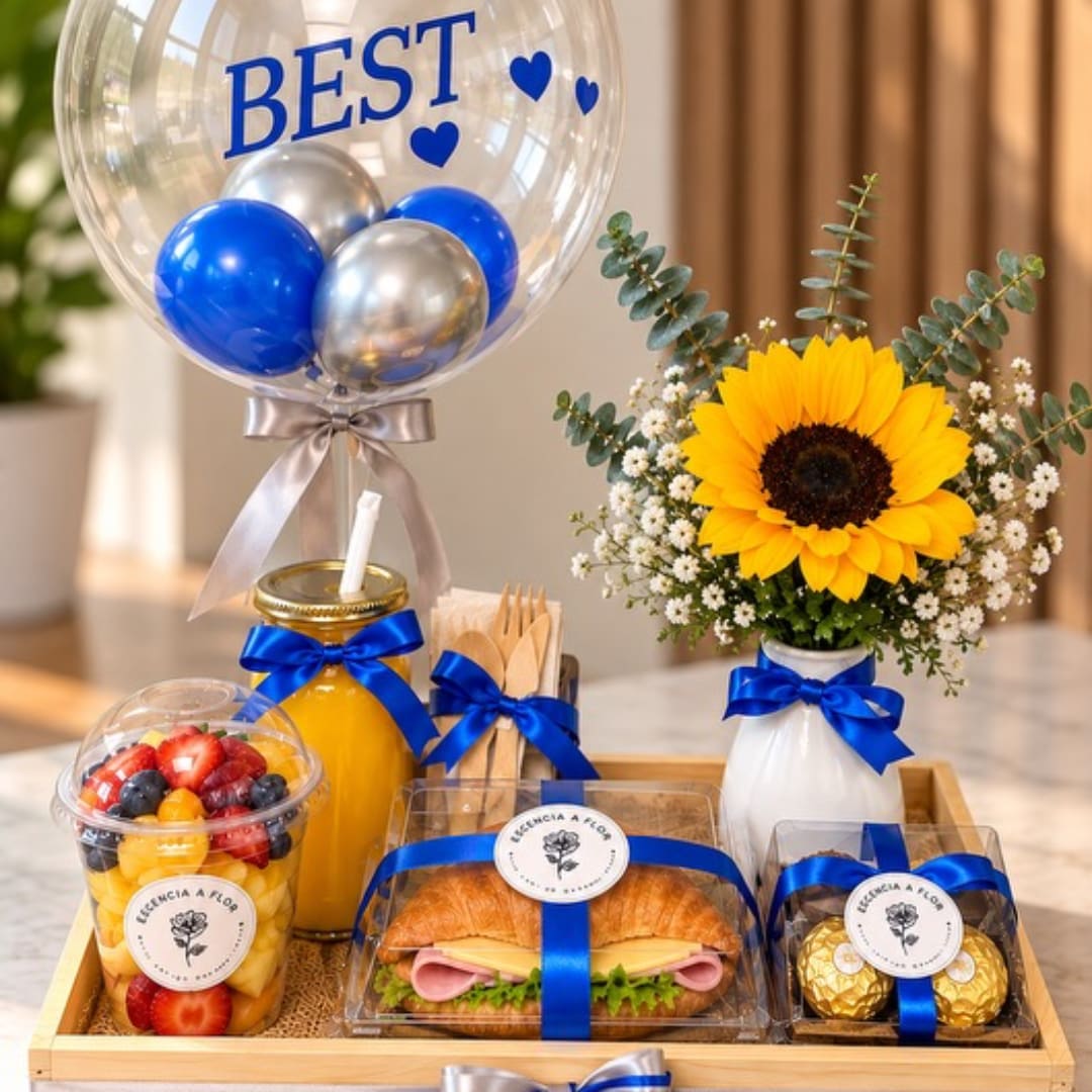 Gift tray with a sunflower vase, fruit cup, sandwich, chocolates, and a balloon