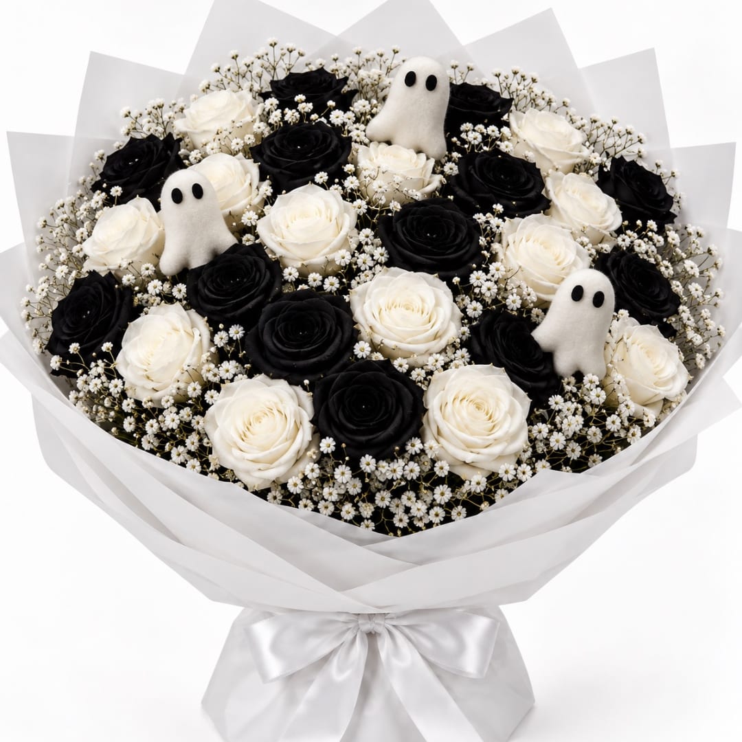 Bouquet of black and white roses with small ghost decorations