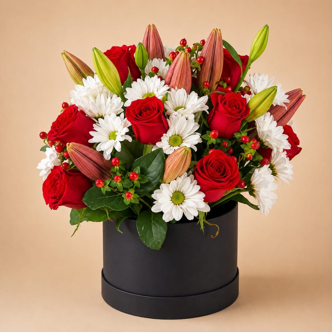 Red roses and white daisies in a black round box