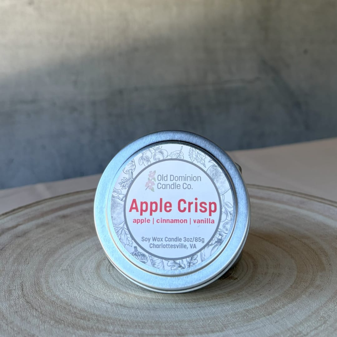 Apple Crisp soy candle in a small metal tin