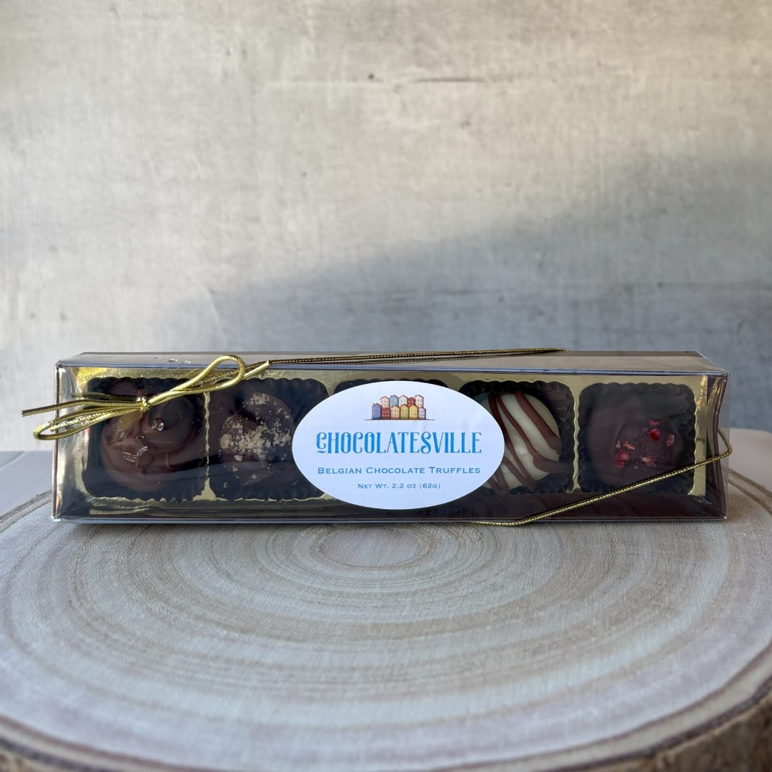 Box of assorted Belgian chocolate truffles with a gold ribbon