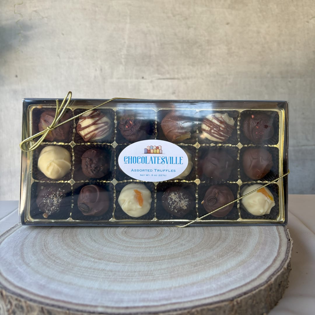 Box of assorted truffles tied with gold ribbon