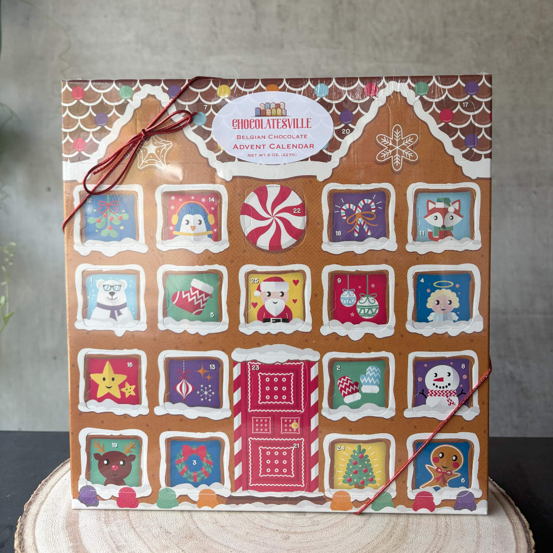Belgian chocolate advent calendar box with holiday illustrations and ribbon