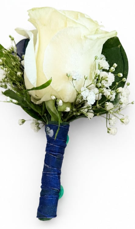 White rose boutonniere with baby's breath and blue ribbon wrap