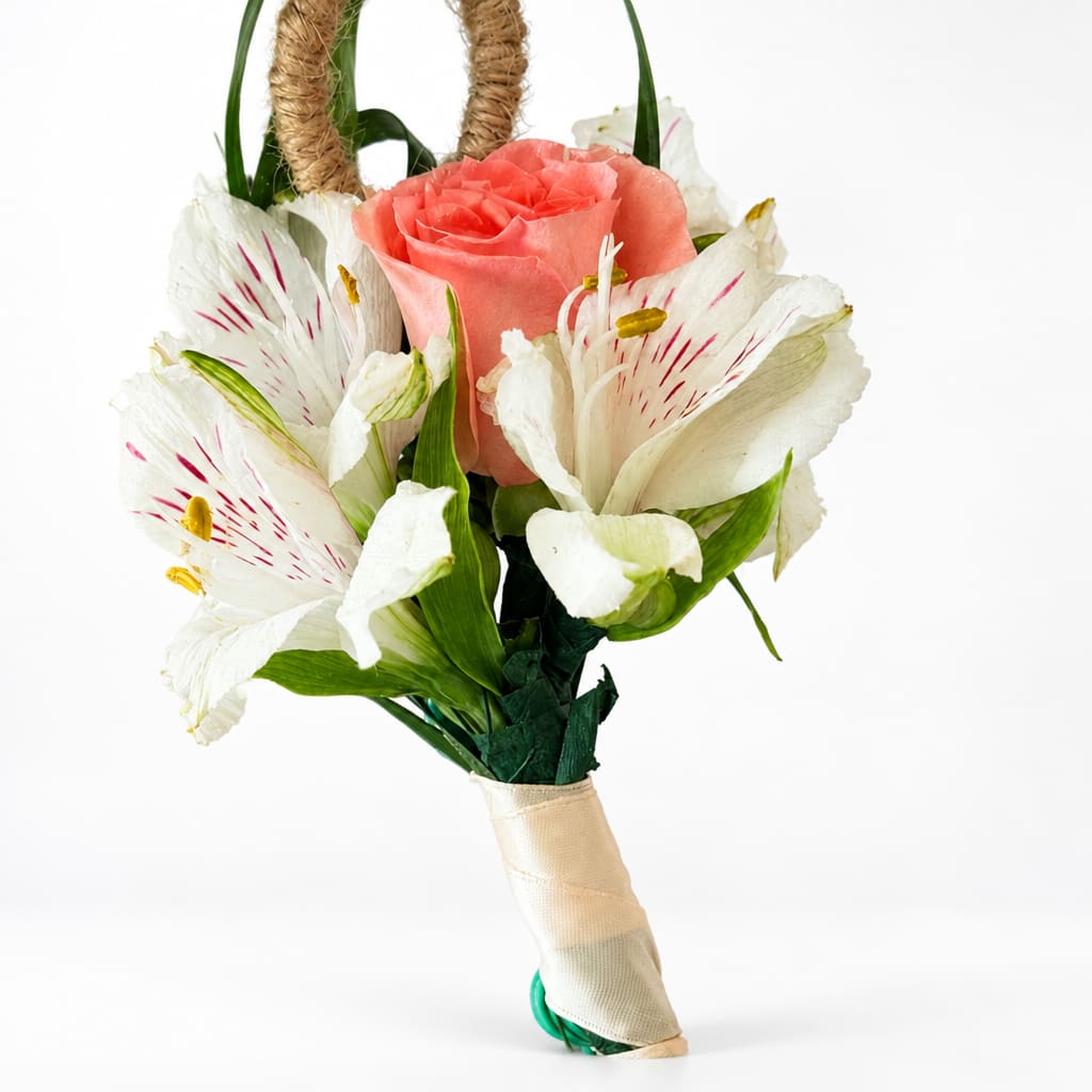 Pink rose bouquet with white alstroemeria and a wrapped handle