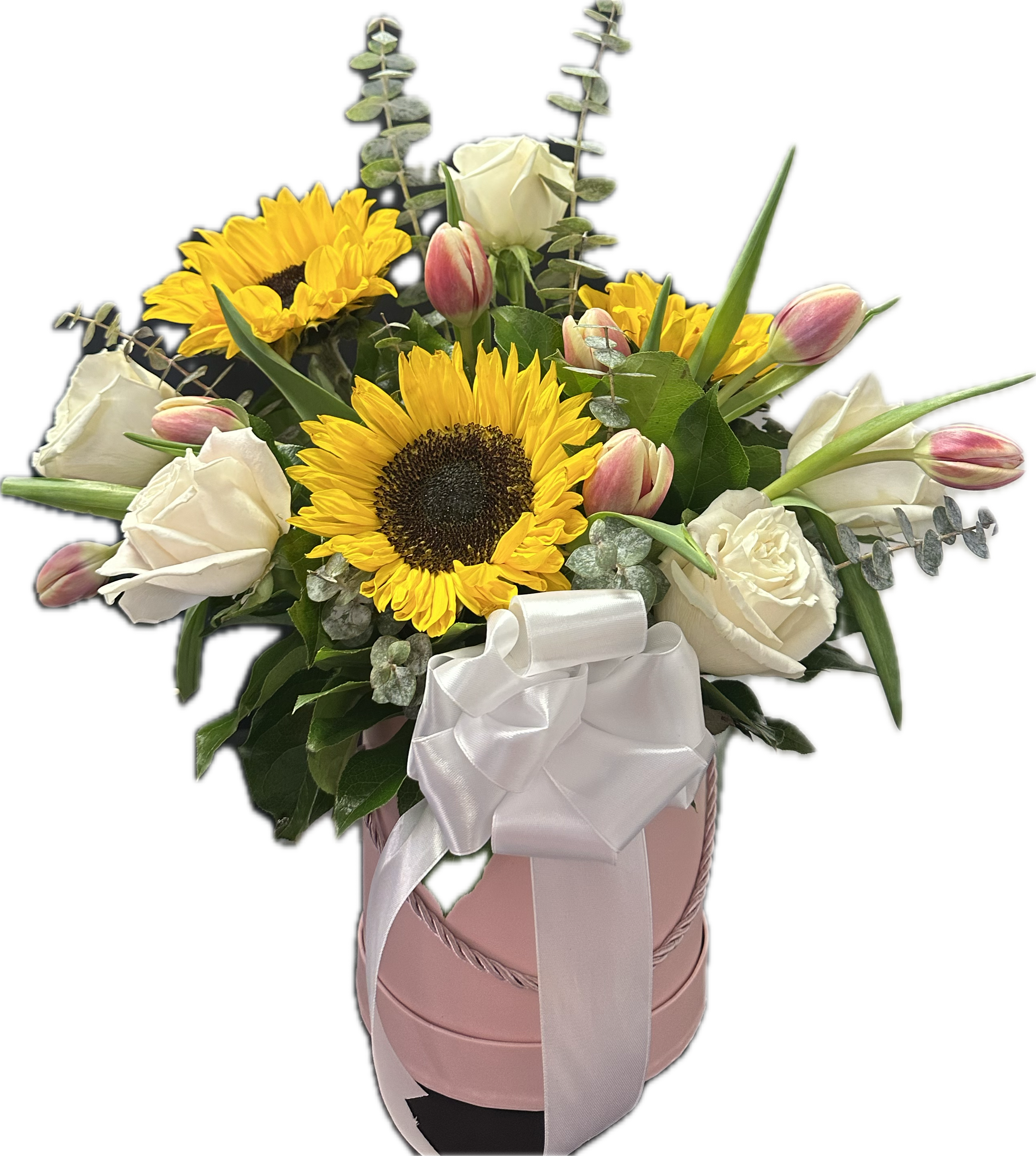 Mi Rayo de Luz - A box arrangement that brings light to the room.   Includes: roses, sunflowers, tulips, eucalyptus, and greenery in a box. 