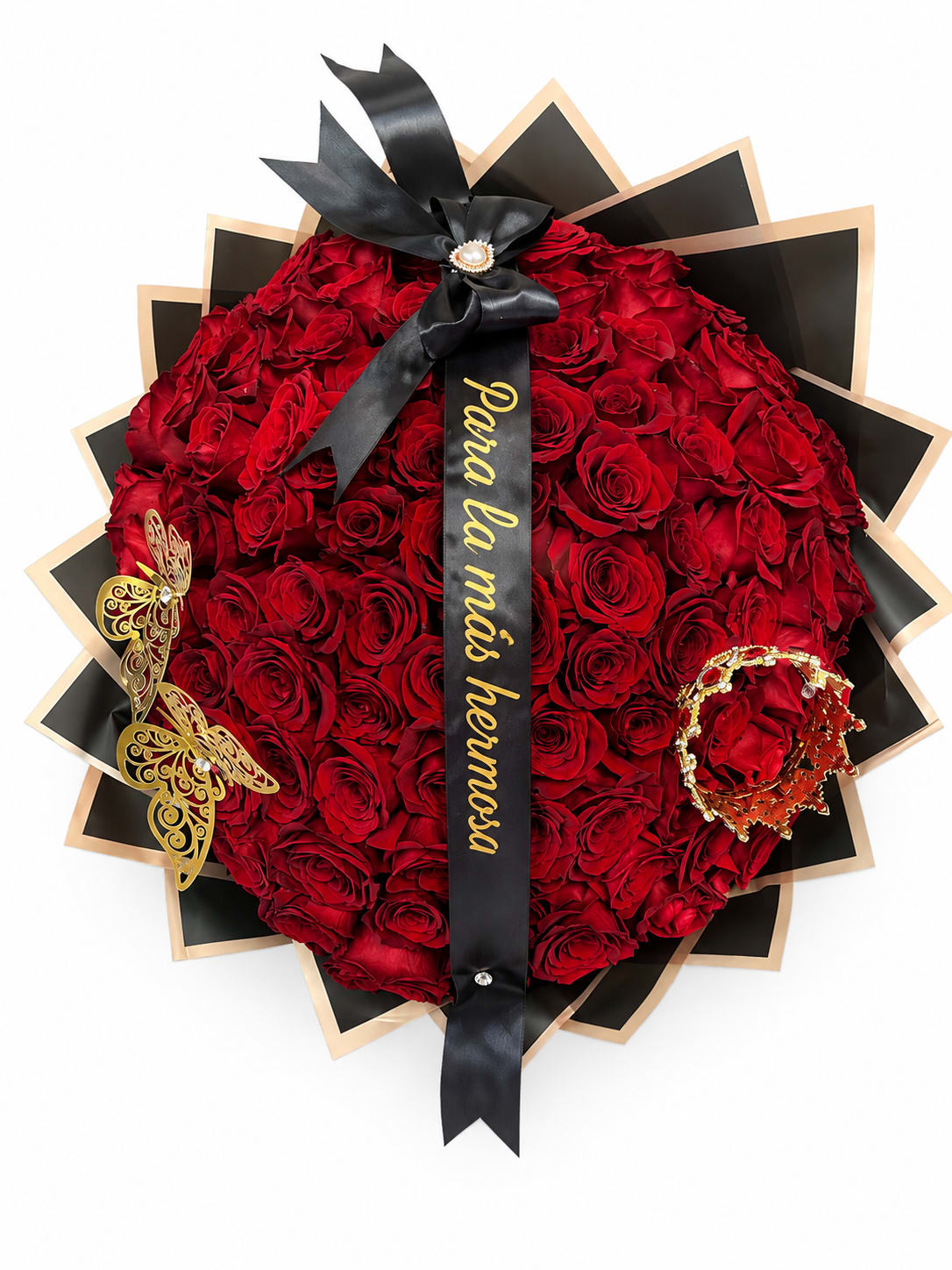 Heart-shaped bouquet of red roses with a black ribbon and gold accents