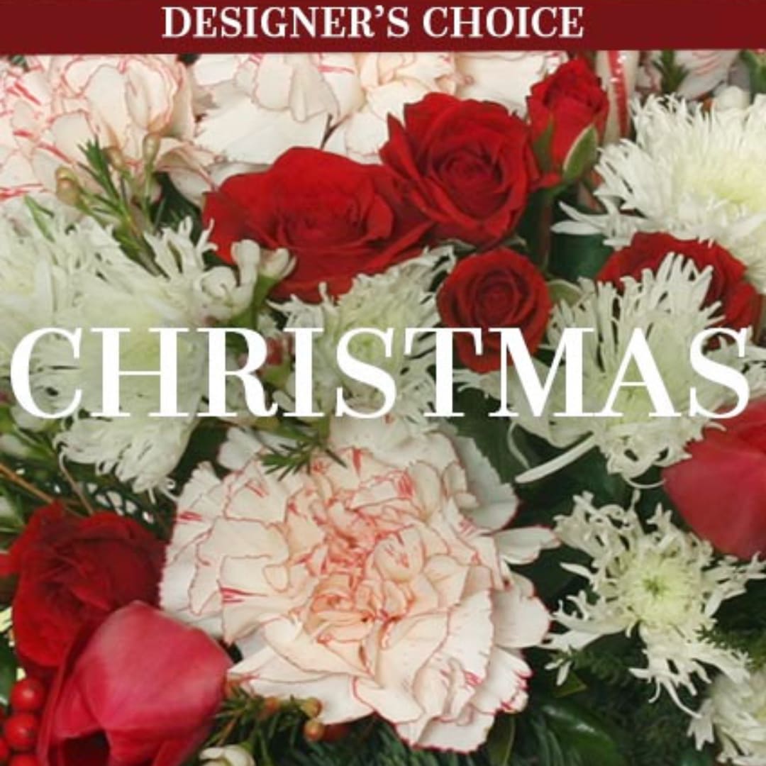 Red roses and white carnations in a Christmas bouquet