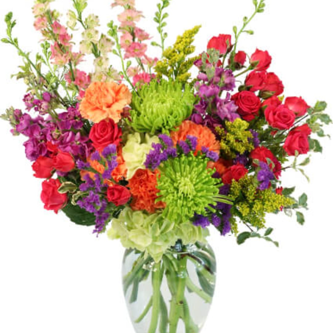Colorful mixed bouquet in a clear glass vase