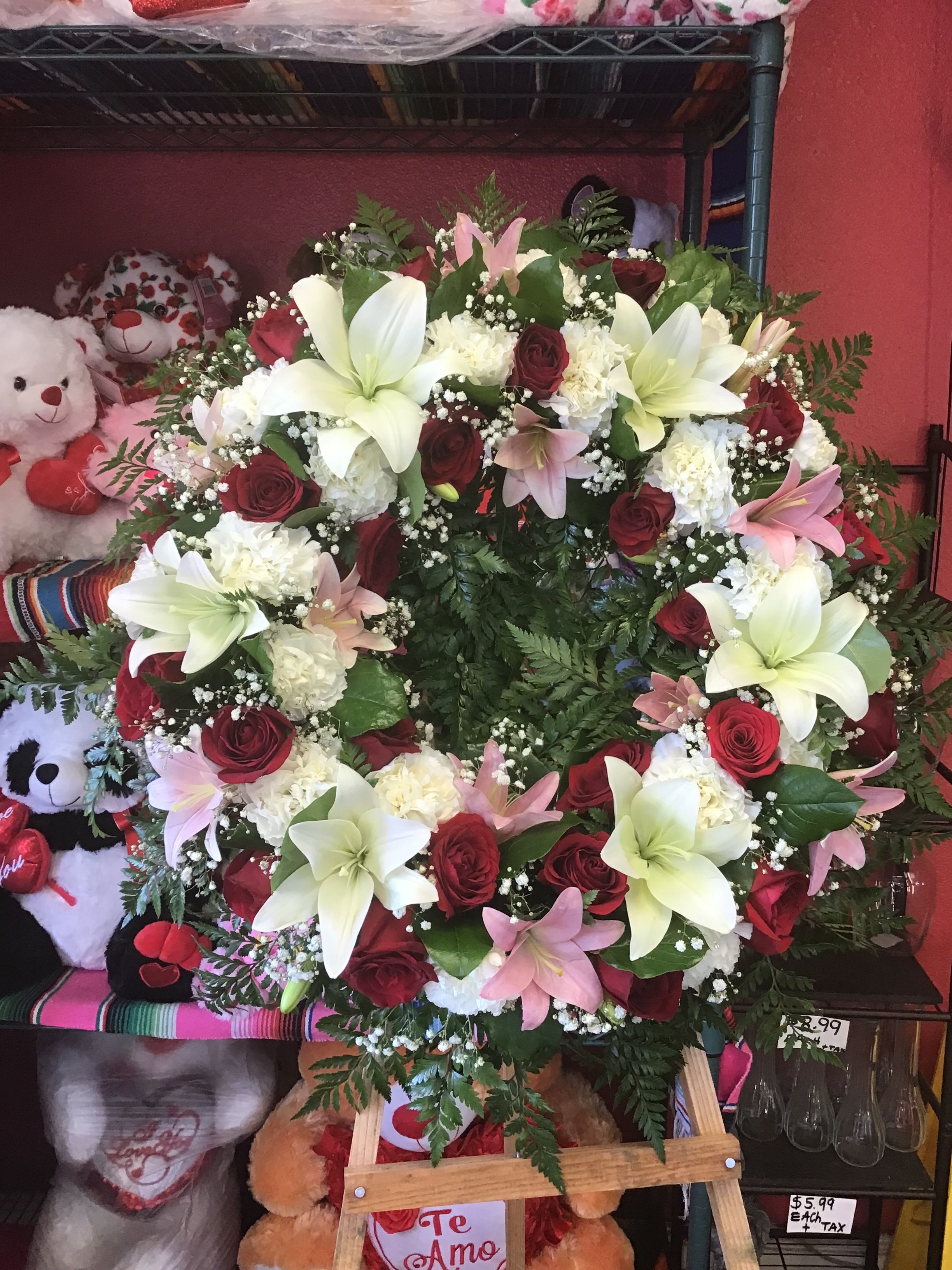 Sympathy Wreath Roses &amp; Lilies  - Beautiful Wreath made with lilies, roses, carnations , and greenery.