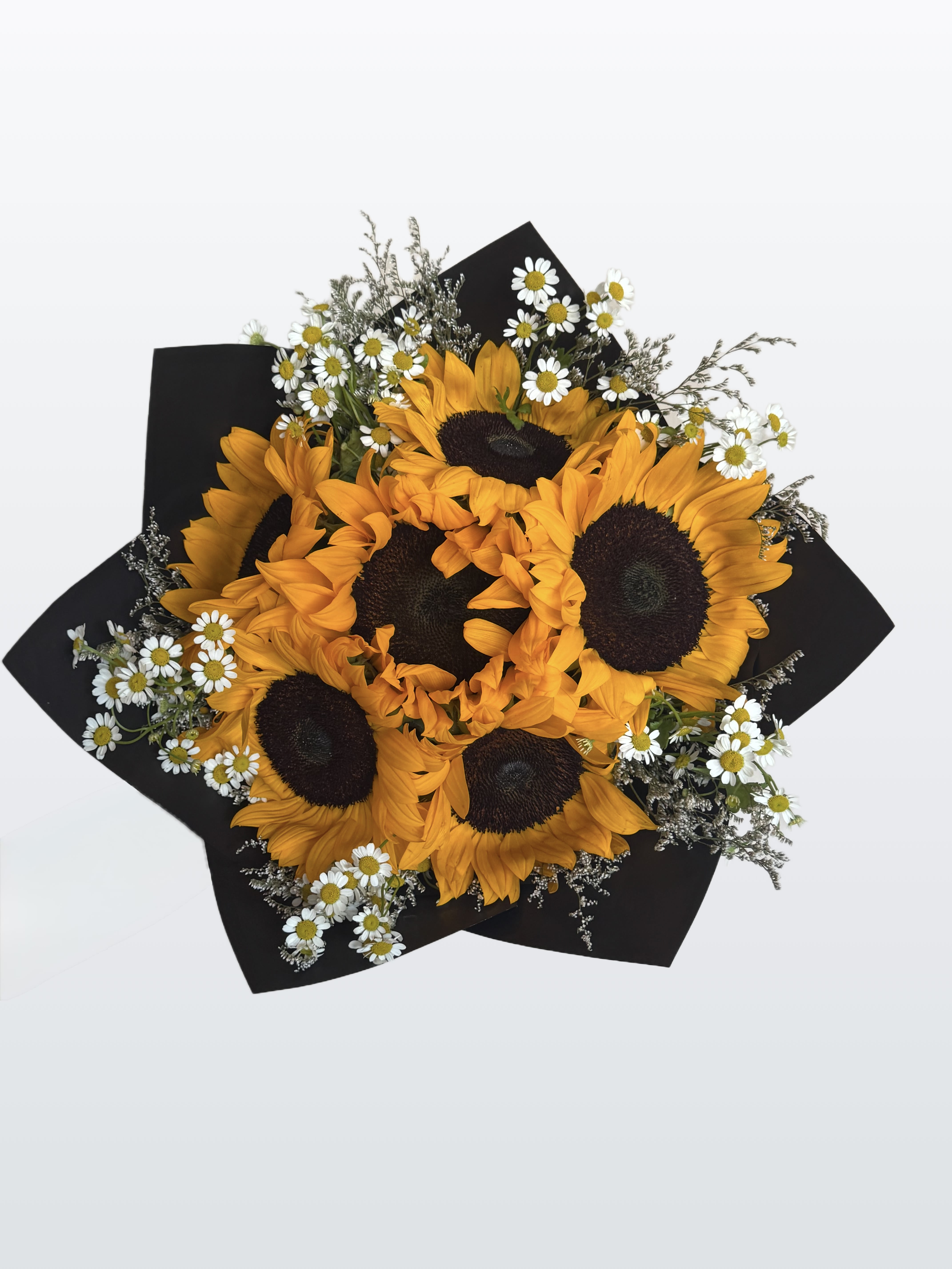 Hello Sunshine - Celebrate National Yellow Flower Day or any special day with a bouquet that radiates warmth and positivity. Wrapped in elegant paper to highlight its brilliant golden blooms, this cheerful arrangement is a beautiful reminder of friendship, appreciation, and the simple joy that flowers can bring.  **Wrapping paper is subject to availability. While the design or pattern may vary, we will do our best to use a similar color and maintain the overall look of the bouquet.**