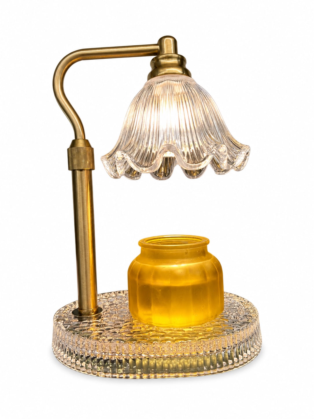 Gold-toned lamp with a clear ribbed glass shade and yellow glass base