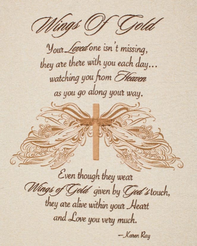 Memorial plaque with the words "Wings Of Gold" and a winged design