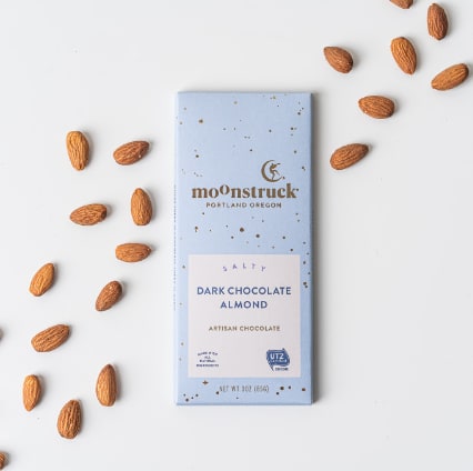 Moonstruck Salty Dark Chocolate Sea Salt Almond Bar - The moon rules the tides in our seas – and salts from those same seas add a delightful contrast to the roasted almond and vanilla sweetness inside this dark chocolate.