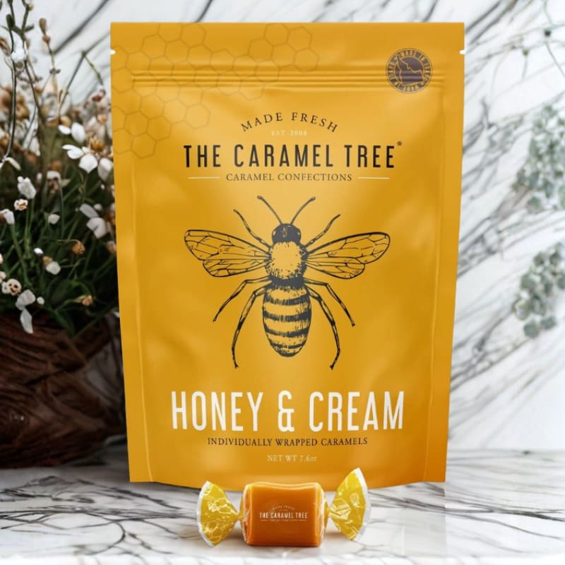 The Caramel Tree Honey + Cream Individually Wrapped Caramels - Experience the sweet taste of the countryside with our Honey &amp; Cream Caramels.  Our signature recipe with a subtle kiss of locally sourced Idaho honey creates the perfect balance of buttery-smooth texture and rich, golden flavor. Sweet and satisfying, these will leave you buzzing with delight!